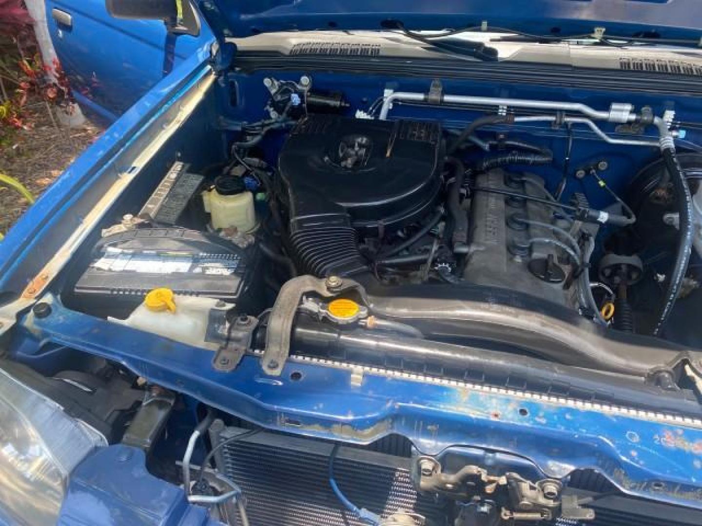 2002 Electric Blue Metallic /Gray Nissan Frontier 2WD XE FL LOW MILES 73,028 (1N6DD26S92C) with an 2.4L DOHC SMPI 16-Valve 4-Cyl Engine engine, Automatic transmission, located at 4701 North Dixie Hwy, Pompano Beach, FL, 33064, (954) 422-2889, 26.240938, -80.123474 - OUR WEBPAGE FLORIDACARS1.COM HAS OVER 100 PHOTOS AND FREE CARFAX LINK 2002 NISSAN FRONTIER XE VIN: 1N6DD26S92C366273 1 N 6 D D 2 6 S 9 2 C 3 6 6 2 7 3 CLUB CAB PICKUP 2.4L I4 F DOHC 16V GASOLINE REAR WHEEL DRIVE Top Features Alloy Wheels Cloth Seats Bed Liner Basic Features ABS Brakes Air Conditioni - Photo#25