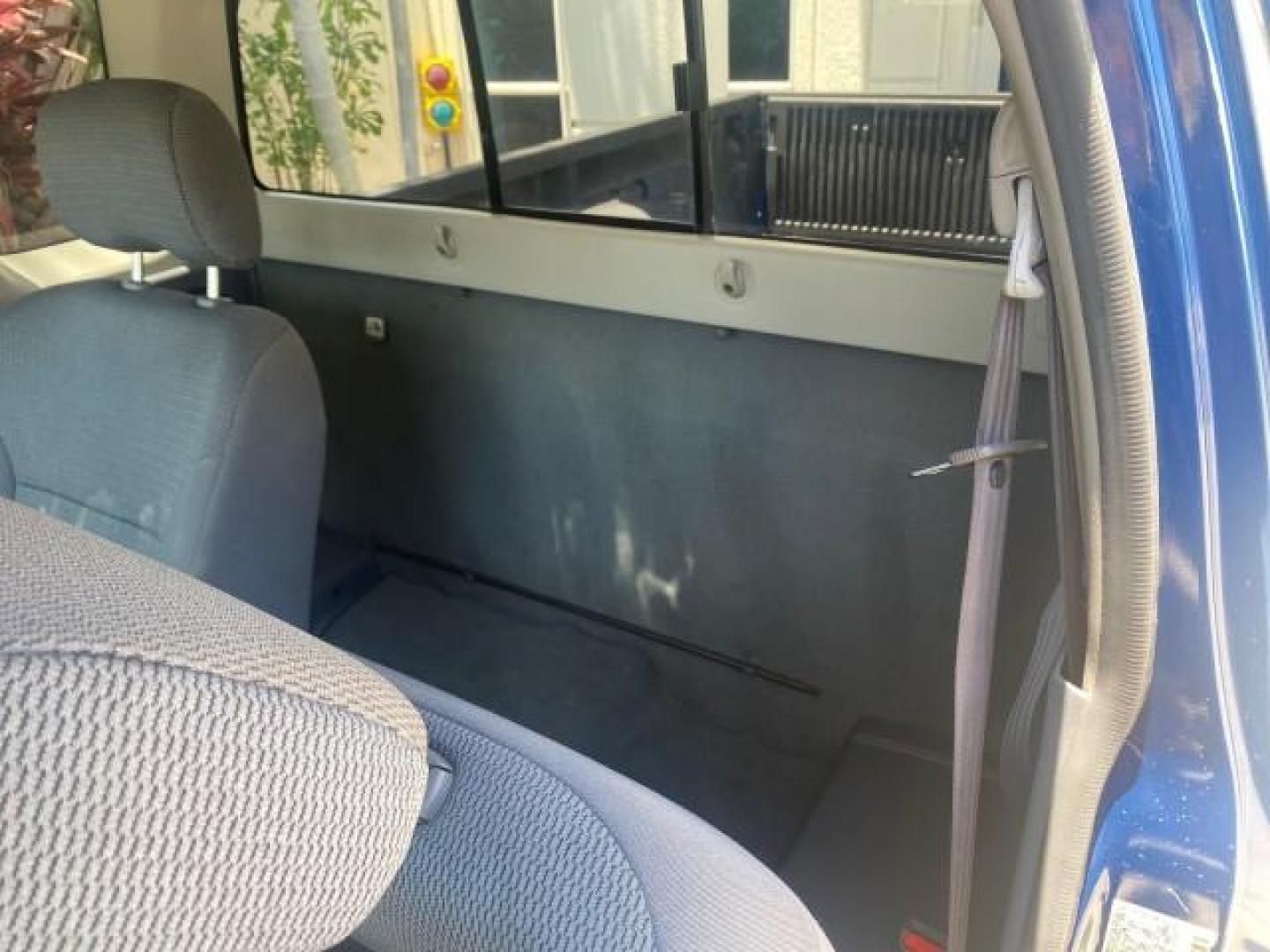2002 Electric Blue Metallic /Gray Nissan Frontier 2WD XE FL LOW MILES 73,028 (1N6DD26S92C) with an 2.4L DOHC SMPI 16-Valve 4-Cyl Engine engine, Automatic transmission, located at 4701 North Dixie Hwy, Pompano Beach, FL, 33064, (954) 422-2889, 26.240938, -80.123474 - OUR WEBPAGE FLORIDACARS1.COM HAS OVER 100 PHOTOS AND FREE CARFAX LINK 2002 NISSAN FRONTIER XE VIN: 1N6DD26S92C366273 1 N 6 D D 2 6 S 9 2 C 3 6 6 2 7 3 CLUB CAB PICKUP 2.4L I4 F DOHC 16V GASOLINE REAR WHEEL DRIVE Top Features Alloy Wheels Cloth Seats Bed Liner Basic Features ABS Brakes Air Conditioni - Photo#56