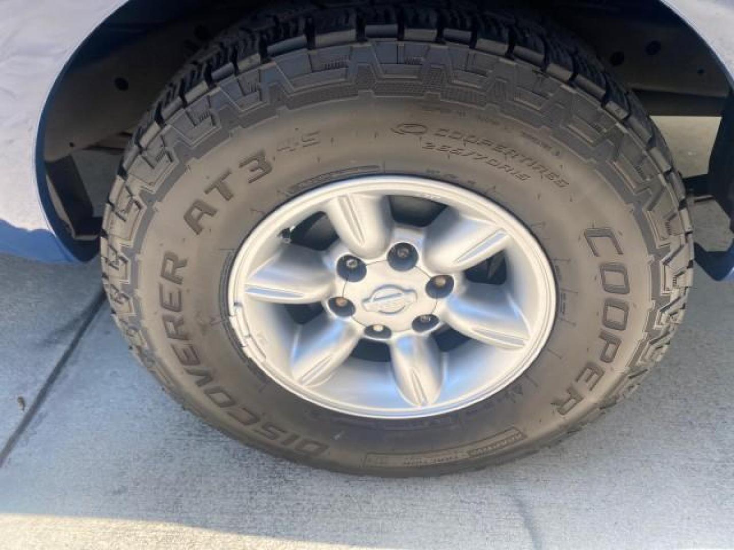 2002 Electric Blue Metallic /Gray Nissan Frontier 2WD XE FL LOW MILES 73,028 (1N6DD26S92C) with an 2.4L DOHC SMPI 16-Valve 4-Cyl Engine engine, Automatic transmission, located at 4701 North Dixie Hwy, Pompano Beach, FL, 33064, (954) 422-2889, 26.240938, -80.123474 - OUR WEBPAGE FLORIDACARS1.COM HAS OVER 100 PHOTOS AND FREE CARFAX LINK 2002 NISSAN FRONTIER XE VIN: 1N6DD26S92C366273 1 N 6 D D 2 6 S 9 2 C 3 6 6 2 7 3 CLUB CAB PICKUP 2.4L I4 F DOHC 16V GASOLINE REAR WHEEL DRIVE Top Features Alloy Wheels Cloth Seats Bed Liner Basic Features ABS Brakes Air Conditioni - Photo#62
