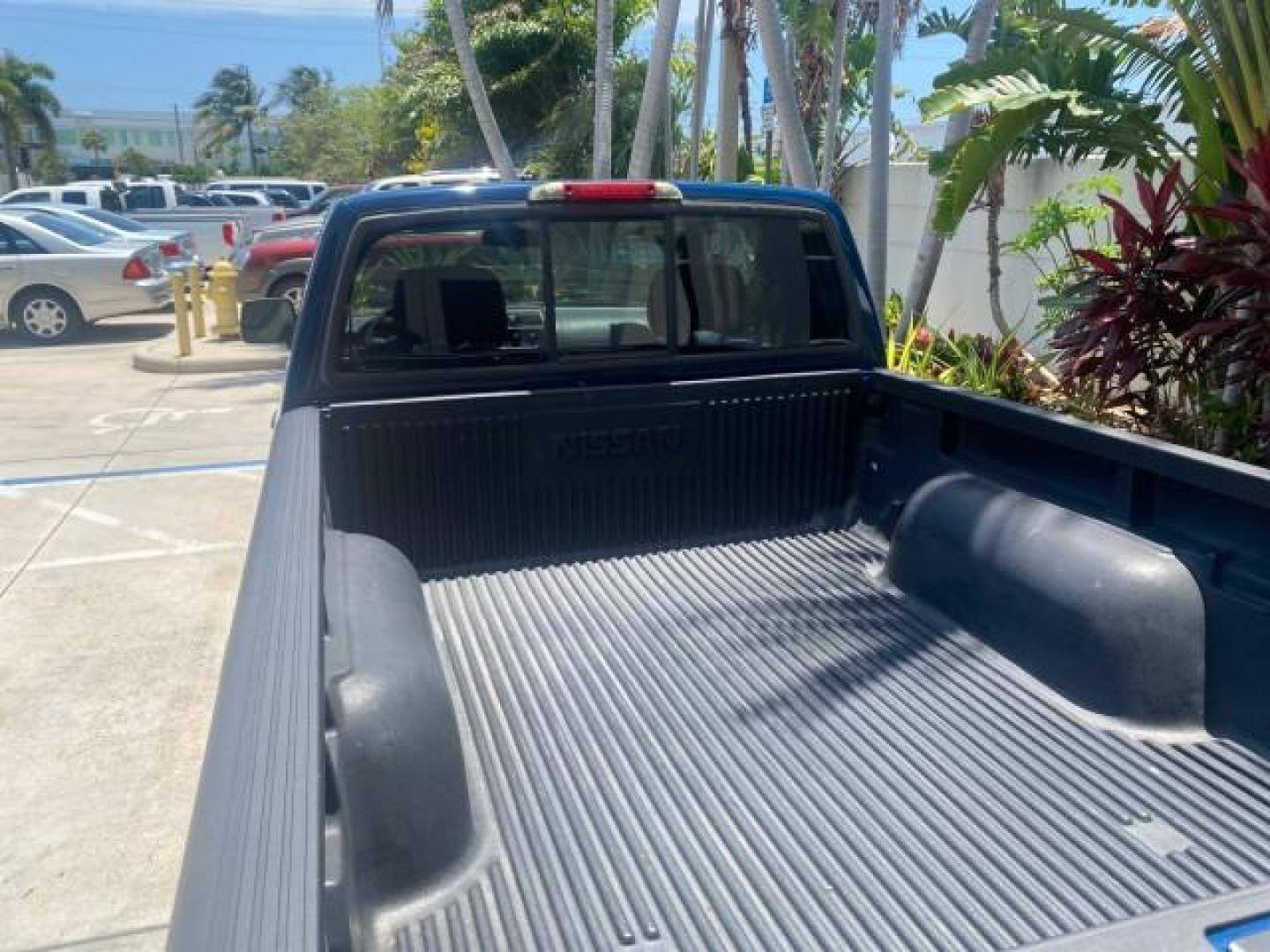 2002 Electric Blue Metallic /Gray Nissan Frontier 2WD XE FL LOW MILES 73,028 (1N6DD26S92C) with an 2.4L DOHC SMPI 16-Valve 4-Cyl Engine engine, Automatic transmission, located at 4701 North Dixie Hwy, Pompano Beach, FL, 33064, (954) 422-2889, 26.240938, -80.123474 - OUR WEBPAGE FLORIDACARS1.COM HAS OVER 100 PHOTOS AND FREE CARFAX LINK 2002 NISSAN FRONTIER XE VIN: 1N6DD26S92C366273 1 N 6 D D 2 6 S 9 2 C 3 6 6 2 7 3 CLUB CAB PICKUP 2.4L I4 F DOHC 16V GASOLINE REAR WHEEL DRIVE Top Features Alloy Wheels Cloth Seats Bed Liner Basic Features ABS Brakes Air Conditioni - Photo#66