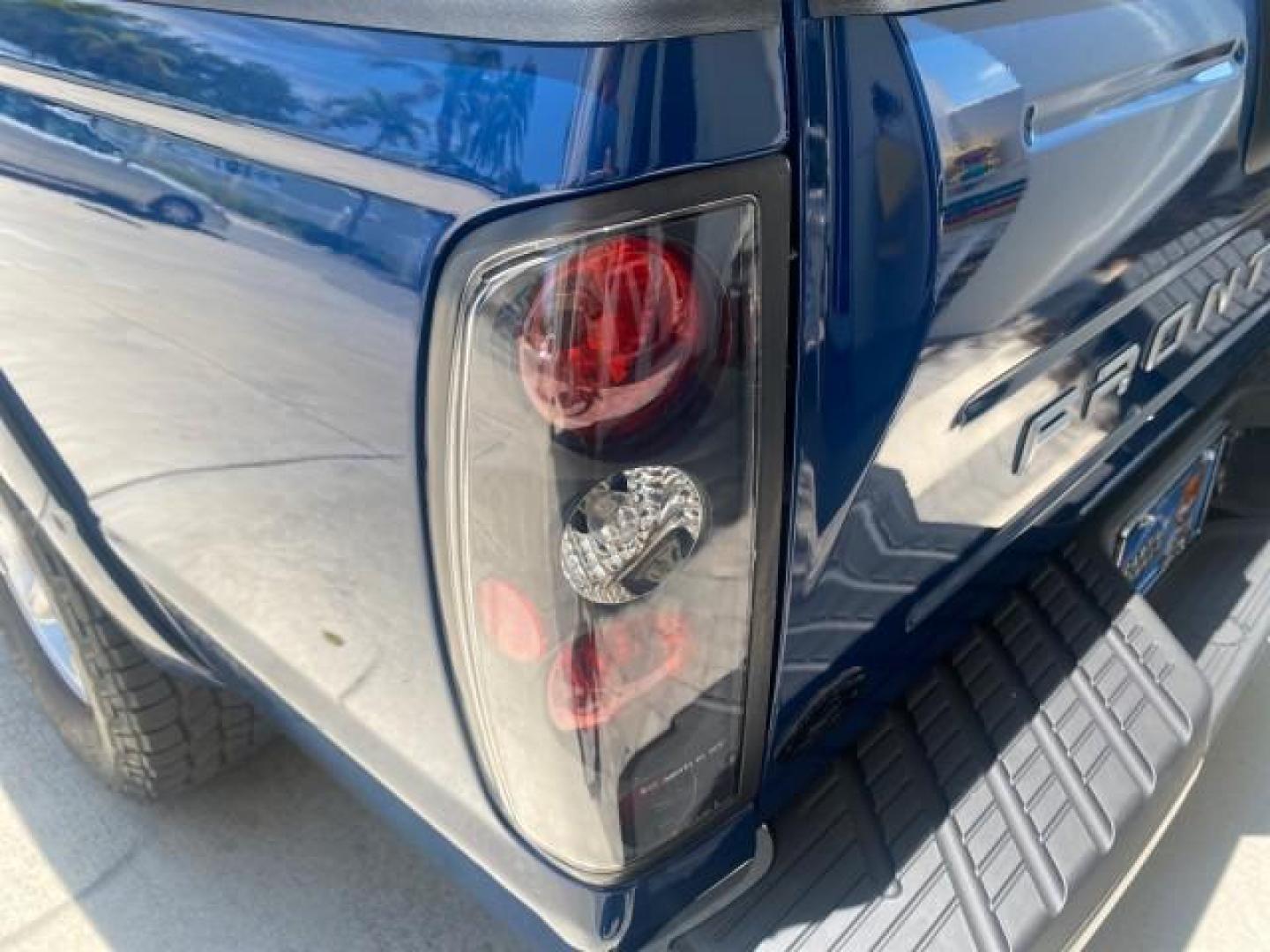 2002 Electric Blue Metallic /Gray Nissan Frontier 2WD XE FL LOW MILES 73,028 (1N6DD26S92C) with an 2.4L DOHC SMPI 16-Valve 4-Cyl Engine engine, Automatic transmission, located at 4701 North Dixie Hwy, Pompano Beach, FL, 33064, (954) 422-2889, 26.240938, -80.123474 - OUR WEBPAGE FLORIDACARS1.COM HAS OVER 100 PHOTOS AND FREE CARFAX LINK 2002 NISSAN FRONTIER XE VIN: 1N6DD26S92C366273 1 N 6 D D 2 6 S 9 2 C 3 6 6 2 7 3 CLUB CAB PICKUP 2.4L I4 F DOHC 16V GASOLINE REAR WHEEL DRIVE Top Features Alloy Wheels Cloth Seats Bed Liner Basic Features ABS Brakes Air Conditioni - Photo#69