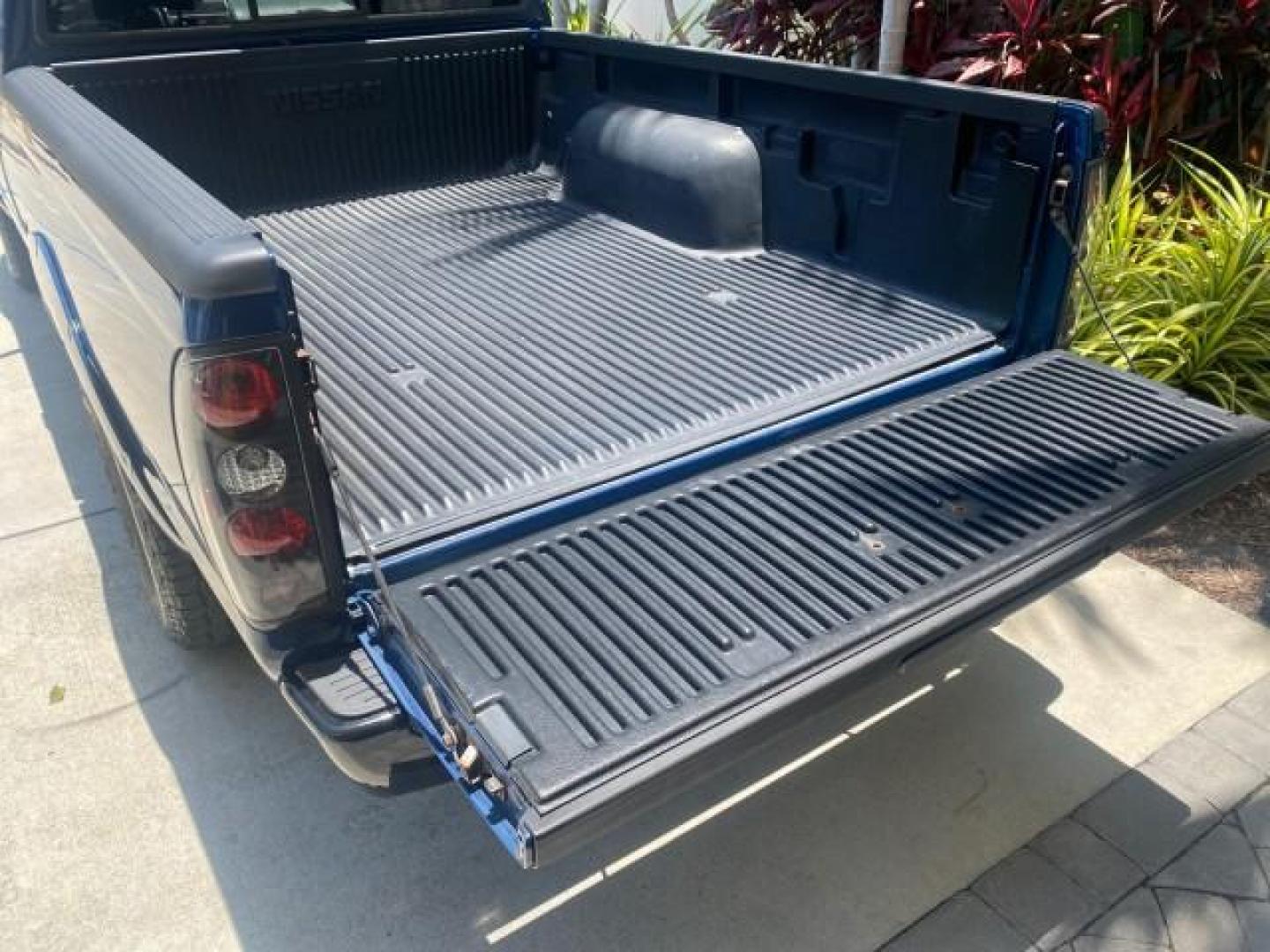 2002 Electric Blue Metallic /Gray Nissan Frontier 2WD XE FL LOW MILES 73,028 (1N6DD26S92C) with an 2.4L DOHC SMPI 16-Valve 4-Cyl Engine engine, Automatic transmission, located at 4701 North Dixie Hwy, Pompano Beach, FL, 33064, (954) 422-2889, 26.240938, -80.123474 - OUR WEBPAGE FLORIDACARS1.COM HAS OVER 100 PHOTOS AND FREE CARFAX LINK 2002 NISSAN FRONTIER XE VIN: 1N6DD26S92C366273 1 N 6 D D 2 6 S 9 2 C 3 6 6 2 7 3 CLUB CAB PICKUP 2.4L I4 F DOHC 16V GASOLINE REAR WHEEL DRIVE Top Features Alloy Wheels Cloth Seats Bed Liner Basic Features ABS Brakes Air Conditioni - Photo#74