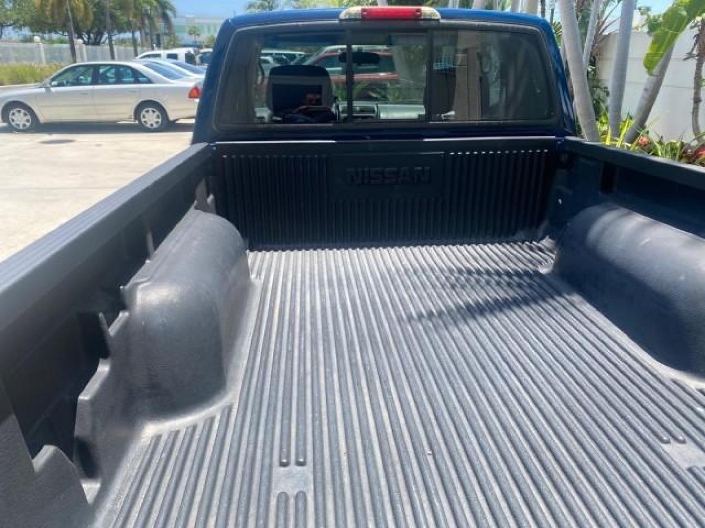 2002 Electric Blue Metallic /Gray Nissan Frontier 2WD XE FL LOW MILES 73,028 (1N6DD26S92C) with an 2.4L DOHC SMPI 16-Valve 4-Cyl Engine engine, Automatic transmission, located at 4701 North Dixie Hwy, Pompano Beach, FL, 33064, (954) 422-2889, 26.240938, -80.123474 - OUR WEBPAGE FLORIDACARS1.COM HAS OVER 100 PHOTOS AND FREE CARFAX LINK 2002 NISSAN FRONTIER XE VIN: 1N6DD26S92C366273 1 N 6 D D 2 6 S 9 2 C 3 6 6 2 7 3 CLUB CAB PICKUP 2.4L I4 F DOHC 16V GASOLINE REAR WHEEL DRIVE Top Features Alloy Wheels Cloth Seats Bed Liner Basic Features ABS Brakes Air Conditioni - Photo#76