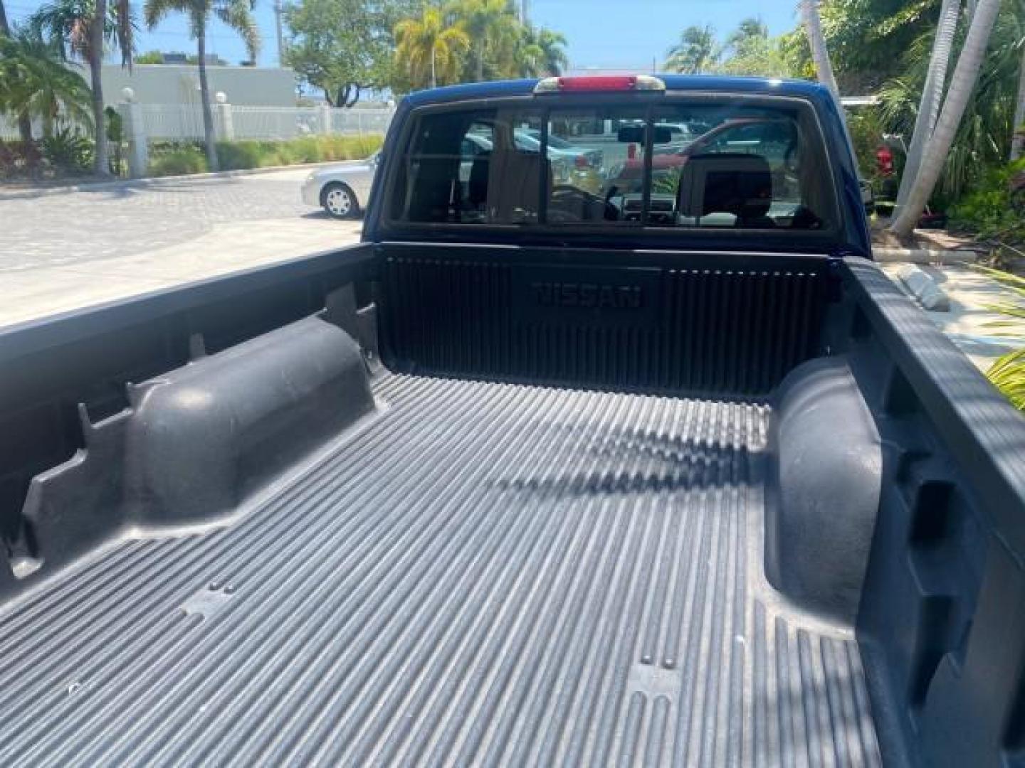 2002 Electric Blue Metallic /Gray Nissan Frontier 2WD XE FL LOW MILES 73,028 (1N6DD26S92C) with an 2.4L DOHC SMPI 16-Valve 4-Cyl Engine engine, Automatic transmission, located at 4701 North Dixie Hwy, Pompano Beach, FL, 33064, (954) 422-2889, 26.240938, -80.123474 - OUR WEBPAGE FLORIDACARS1.COM HAS OVER 100 PHOTOS AND FREE CARFAX LINK 2002 NISSAN FRONTIER XE VIN: 1N6DD26S92C366273 1 N 6 D D 2 6 S 9 2 C 3 6 6 2 7 3 CLUB CAB PICKUP 2.4L I4 F DOHC 16V GASOLINE REAR WHEEL DRIVE Top Features Alloy Wheels Cloth Seats Bed Liner Basic Features ABS Brakes Air Conditioni - Photo#79
