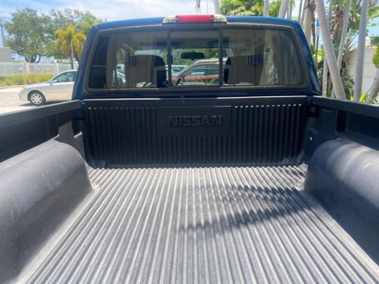 2002 Electric Blue Metallic /Gray Nissan Frontier 2WD XE FL LOW MILES 73,028 (1N6DD26S92C) with an 2.4L DOHC SMPI 16-Valve 4-Cyl Engine engine, Automatic transmission, located at 4701 North Dixie Hwy, Pompano Beach, FL, 33064, (954) 422-2889, 26.240938, -80.123474 - OUR WEBPAGE FLORIDACARS1.COM HAS OVER 100 PHOTOS AND FREE CARFAX LINK 2002 NISSAN FRONTIER XE VIN: 1N6DD26S92C366273 1 N 6 D D 2 6 S 9 2 C 3 6 6 2 7 3 CLUB CAB PICKUP 2.4L I4 F DOHC 16V GASOLINE REAR WHEEL DRIVE Top Features Alloy Wheels Cloth Seats Bed Liner Basic Features ABS Brakes Air Conditioni - Photo#80