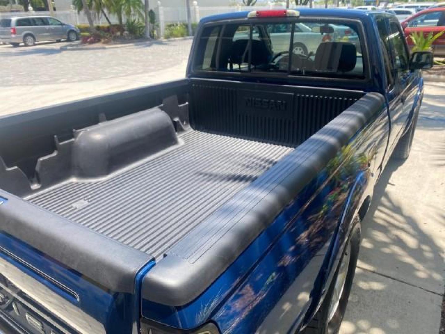 2002 Electric Blue Metallic /Gray Nissan Frontier 2WD XE FL LOW MILES 73,028 (1N6DD26S92C) with an 2.4L DOHC SMPI 16-Valve 4-Cyl Engine engine, Automatic transmission, located at 4701 North Dixie Hwy, Pompano Beach, FL, 33064, (954) 422-2889, 26.240938, -80.123474 - OUR WEBPAGE FLORIDACARS1.COM HAS OVER 100 PHOTOS AND FREE CARFAX LINK 2002 NISSAN FRONTIER XE VIN: 1N6DD26S92C366273 1 N 6 D D 2 6 S 9 2 C 3 6 6 2 7 3 CLUB CAB PICKUP 2.4L I4 F DOHC 16V GASOLINE REAR WHEEL DRIVE Top Features Alloy Wheels Cloth Seats Bed Liner Basic Features ABS Brakes Air Conditioni - Photo#84