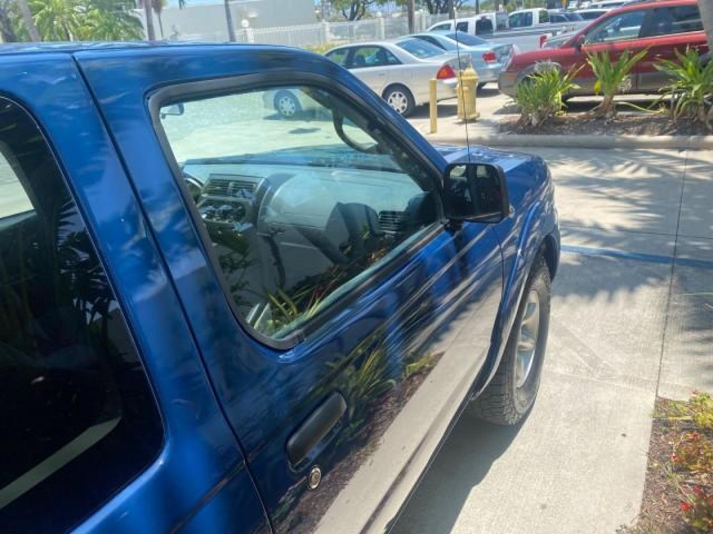 2002 Electric Blue Metallic /Gray Nissan Frontier 2WD XE FL LOW MILES 73,028 (1N6DD26S92C) with an 2.4L DOHC SMPI 16-Valve 4-Cyl Engine engine, Automatic transmission, located at 4701 North Dixie Hwy, Pompano Beach, FL, 33064, (954) 422-2889, 26.240938, -80.123474 - OUR WEBPAGE FLORIDACARS1.COM HAS OVER 100 PHOTOS AND FREE CARFAX LINK 2002 NISSAN FRONTIER XE VIN: 1N6DD26S92C366273 1 N 6 D D 2 6 S 9 2 C 3 6 6 2 7 3 CLUB CAB PICKUP 2.4L I4 F DOHC 16V GASOLINE REAR WHEEL DRIVE Top Features Alloy Wheels Cloth Seats Bed Liner Basic Features ABS Brakes Air Conditioni - Photo#92