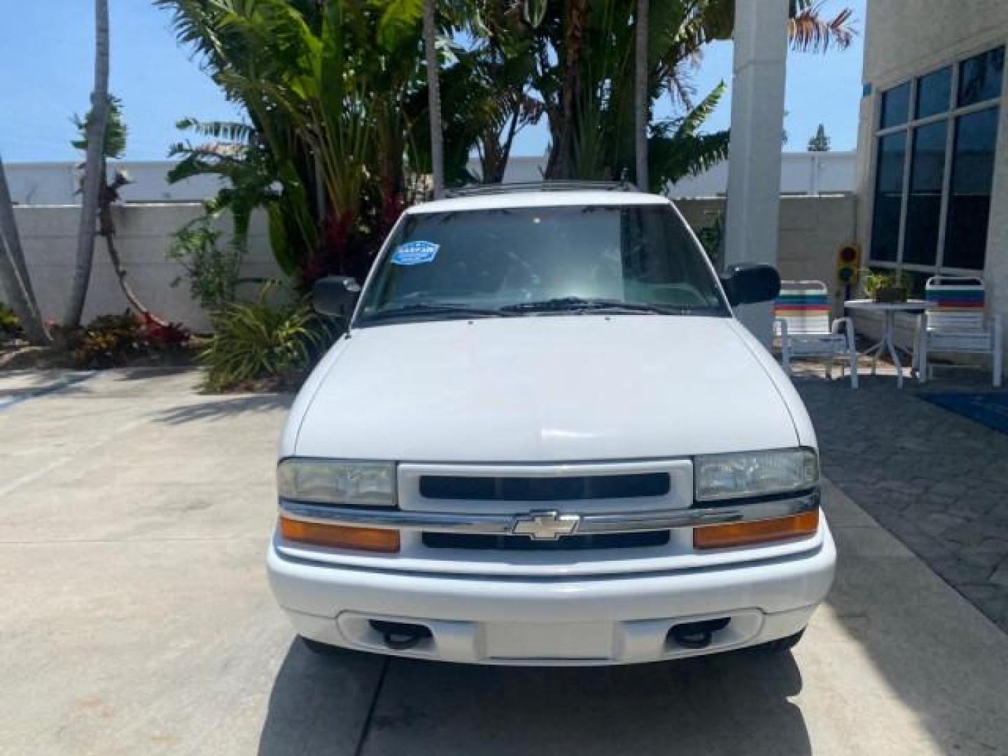2003 Summit White /Medium Gray Chevrolet Blazer LS 4WD LOW MILES 71,072 (1GNDT13X33K) with an 4.3L Vortec 4300 V6 MFI Engine engine, Automatic transmission, located at 4701 North Dixie Hwy, Pompano Beach, FL, 33064, (954) 422-2889, 26.240938, -80.123474 - OUR WEBPAGE FLORIDACARS1.COM HAS OVER 100 PHOTOS AND FREE CARFAX LINK 2003 CHEVROLET BLAZER LS VIN: 1GNDT13X33K114534 1 G N D T 1 3 X 3 3 K 1 1 4 5 3 4 4 DOOR WAGON/SPORT UTILITY 4.3L V6 F OHV 12V GASOLINE REAR WHEEL DRIVE W/ 4X4 Top Features 4WD/AWD Alloy Wheels Cloth Seats Basic Features ABS Brake - Photo#2