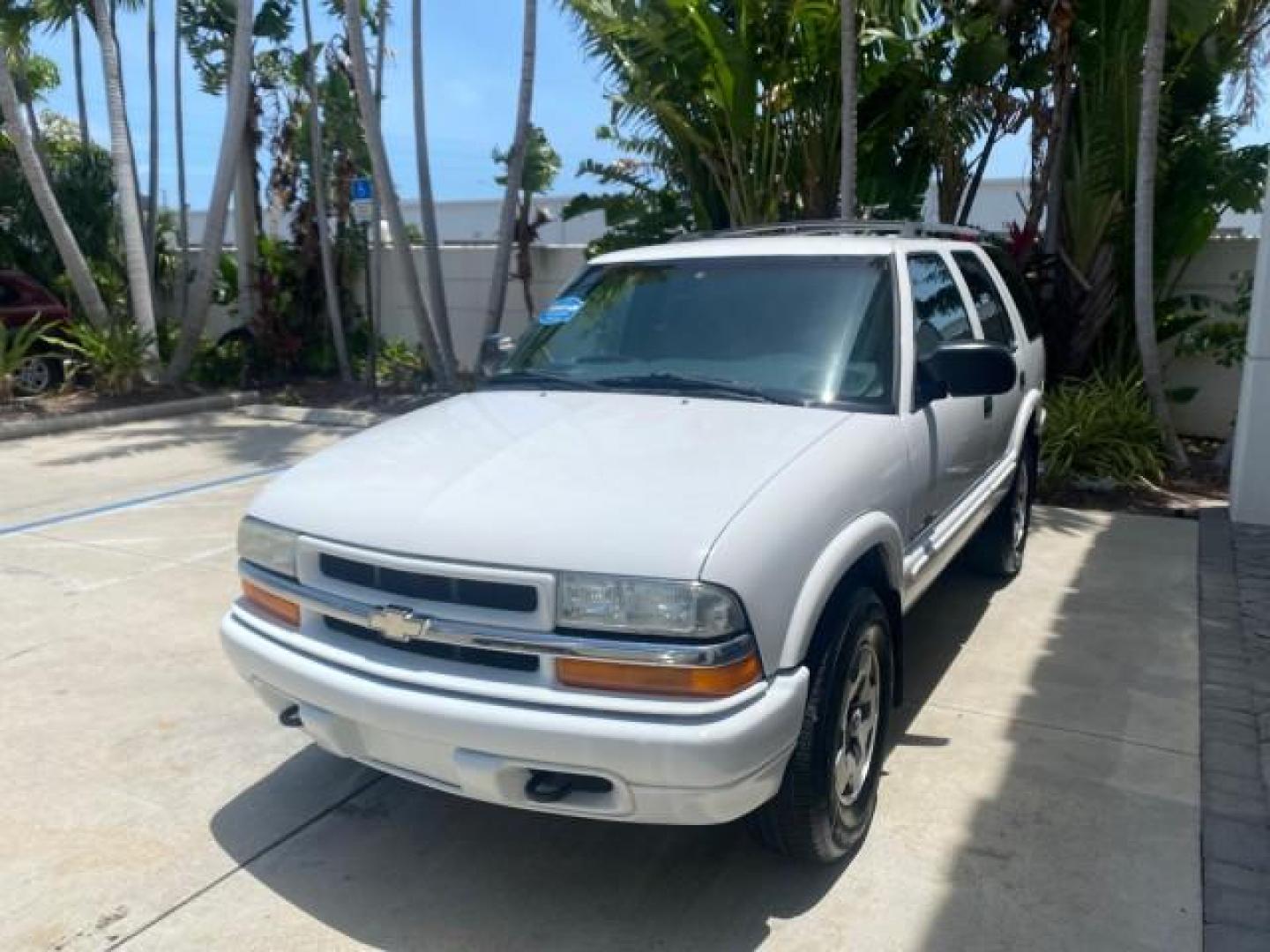 2003 Summit White /Medium Gray Chevrolet Blazer LS 4WD LOW MILES 71,072 (1GNDT13X33K) with an 4.3L Vortec 4300 V6 MFI Engine engine, Automatic transmission, located at 4701 North Dixie Hwy, Pompano Beach, FL, 33064, (954) 422-2889, 26.240938, -80.123474 - OUR WEBPAGE FLORIDACARS1.COM HAS OVER 100 PHOTOS AND FREE CARFAX LINK 2003 CHEVROLET BLAZER LS VIN: 1GNDT13X33K114534 1 G N D T 1 3 X 3 3 K 1 1 4 5 3 4 4 DOOR WAGON/SPORT UTILITY 4.3L V6 F OHV 12V GASOLINE REAR WHEEL DRIVE W/ 4X4 Top Features 4WD/AWD Alloy Wheels Cloth Seats Basic Features ABS Brake - Photo#3
