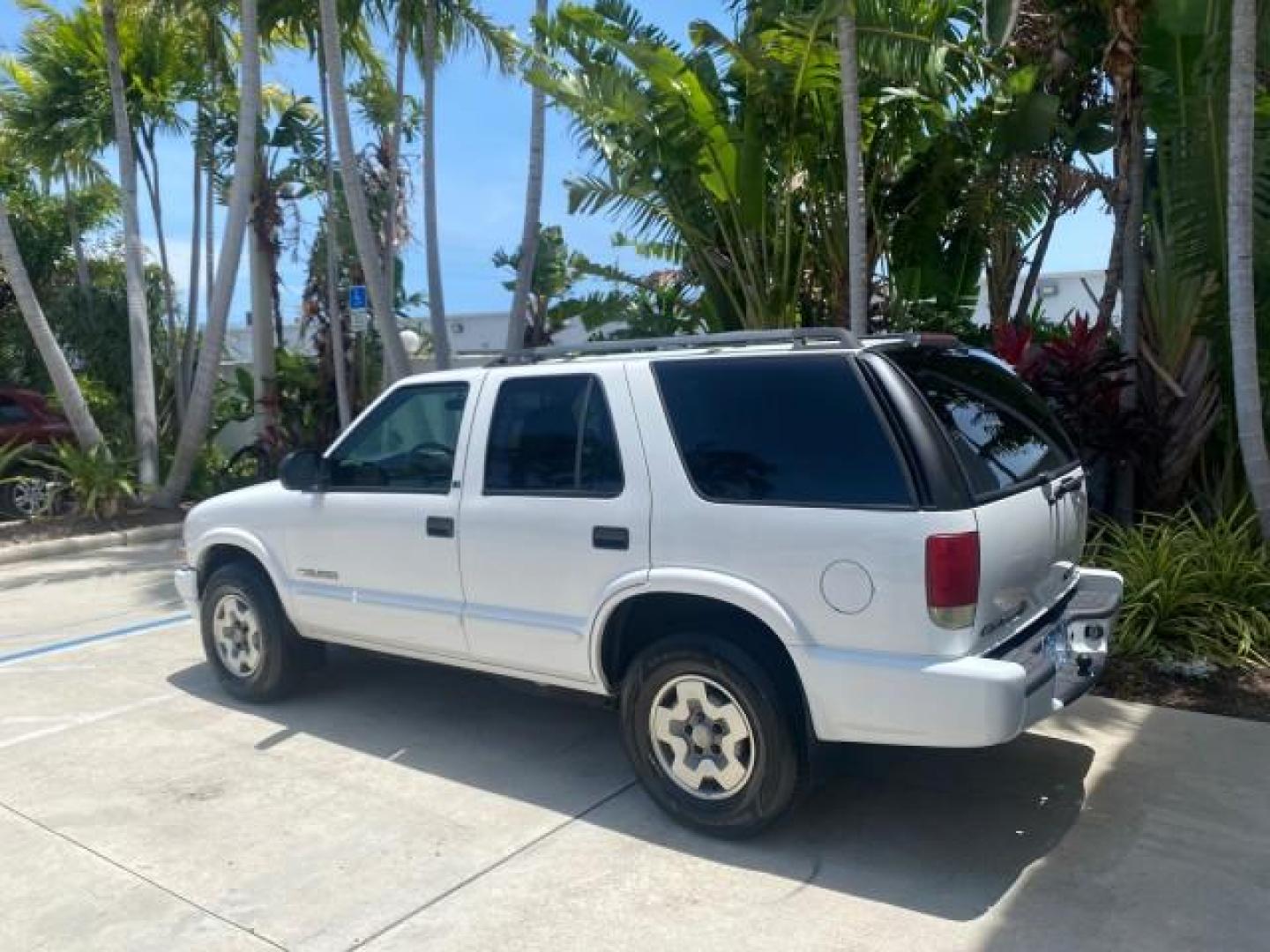 2003 Summit White /Medium Gray Chevrolet Blazer LS 4WD LOW MILES 71,072 (1GNDT13X33K) with an 4.3L Vortec 4300 V6 MFI Engine engine, Automatic transmission, located at 4701 North Dixie Hwy, Pompano Beach, FL, 33064, (954) 422-2889, 26.240938, -80.123474 - OUR WEBPAGE FLORIDACARS1.COM HAS OVER 100 PHOTOS AND FREE CARFAX LINK 2003 CHEVROLET BLAZER LS VIN: 1GNDT13X33K114534 1 G N D T 1 3 X 3 3 K 1 1 4 5 3 4 4 DOOR WAGON/SPORT UTILITY 4.3L V6 F OHV 12V GASOLINE REAR WHEEL DRIVE W/ 4X4 Top Features 4WD/AWD Alloy Wheels Cloth Seats Basic Features ABS Brake - Photo#5