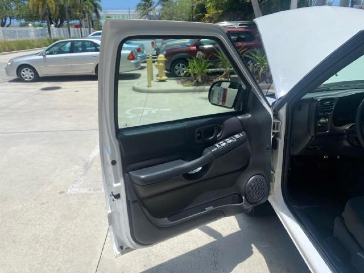 2003 Summit White /Medium Gray Chevrolet Blazer LS 4WD LOW MILES 71,072 (1GNDT13X33K) with an 4.3L Vortec 4300 V6 MFI Engine engine, Automatic transmission, located at 4701 North Dixie Hwy, Pompano Beach, FL, 33064, (954) 422-2889, 26.240938, -80.123474 - OUR WEBPAGE FLORIDACARS1.COM HAS OVER 100 PHOTOS AND FREE CARFAX LINK 2003 CHEVROLET BLAZER LS VIN: 1GNDT13X33K114534 1 G N D T 1 3 X 3 3 K 1 1 4 5 3 4 4 DOOR WAGON/SPORT UTILITY 4.3L V6 F OHV 12V GASOLINE REAR WHEEL DRIVE W/ 4X4 Top Features 4WD/AWD Alloy Wheels Cloth Seats Basic Features ABS Brake - Photo#9