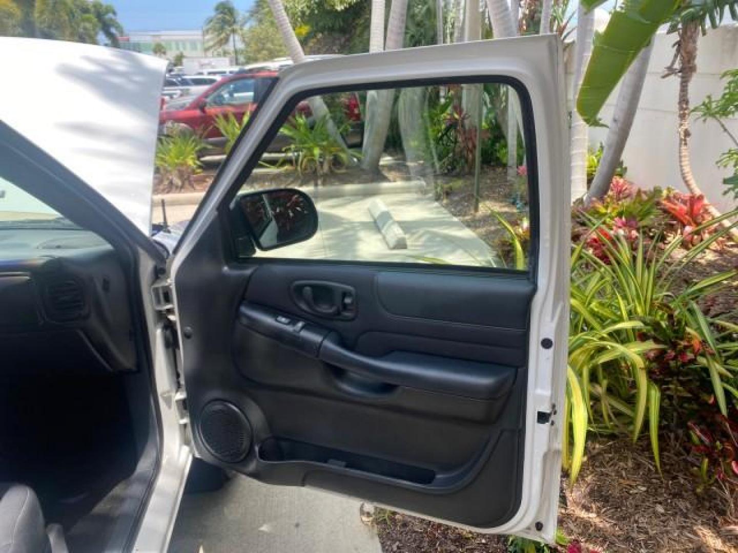 2003 Summit White /Medium Gray Chevrolet Blazer LS 4WD LOW MILES 71,072 (1GNDT13X33K) with an 4.3L Vortec 4300 V6 MFI Engine engine, Automatic transmission, located at 4701 North Dixie Hwy, Pompano Beach, FL, 33064, (954) 422-2889, 26.240938, -80.123474 - OUR WEBPAGE FLORIDACARS1.COM HAS OVER 100 PHOTOS AND FREE CARFAX LINK 2003 CHEVROLET BLAZER LS VIN: 1GNDT13X33K114534 1 G N D T 1 3 X 3 3 K 1 1 4 5 3 4 4 DOOR WAGON/SPORT UTILITY 4.3L V6 F OHV 12V GASOLINE REAR WHEEL DRIVE W/ 4X4 Top Features 4WD/AWD Alloy Wheels Cloth Seats Basic Features ABS Brake - Photo#11