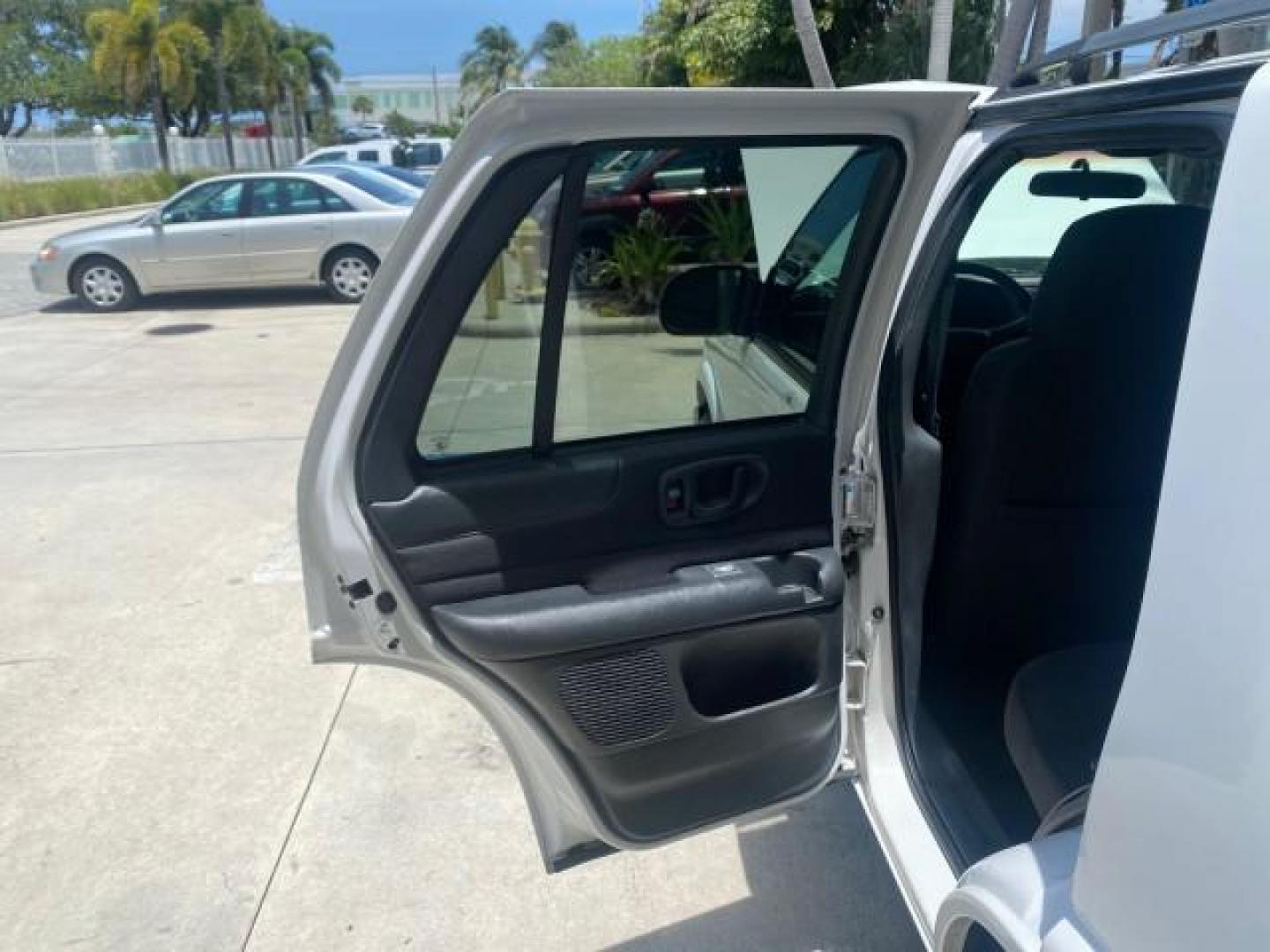 2003 Summit White /Medium Gray Chevrolet Blazer LS 4WD LOW MILES 71,072 (1GNDT13X33K) with an 4.3L Vortec 4300 V6 MFI Engine engine, Automatic transmission, located at 4701 North Dixie Hwy, Pompano Beach, FL, 33064, (954) 422-2889, 26.240938, -80.123474 - OUR WEBPAGE FLORIDACARS1.COM HAS OVER 100 PHOTOS AND FREE CARFAX LINK 2003 CHEVROLET BLAZER LS VIN: 1GNDT13X33K114534 1 G N D T 1 3 X 3 3 K 1 1 4 5 3 4 4 DOOR WAGON/SPORT UTILITY 4.3L V6 F OHV 12V GASOLINE REAR WHEEL DRIVE W/ 4X4 Top Features 4WD/AWD Alloy Wheels Cloth Seats Basic Features ABS Brake - Photo#13