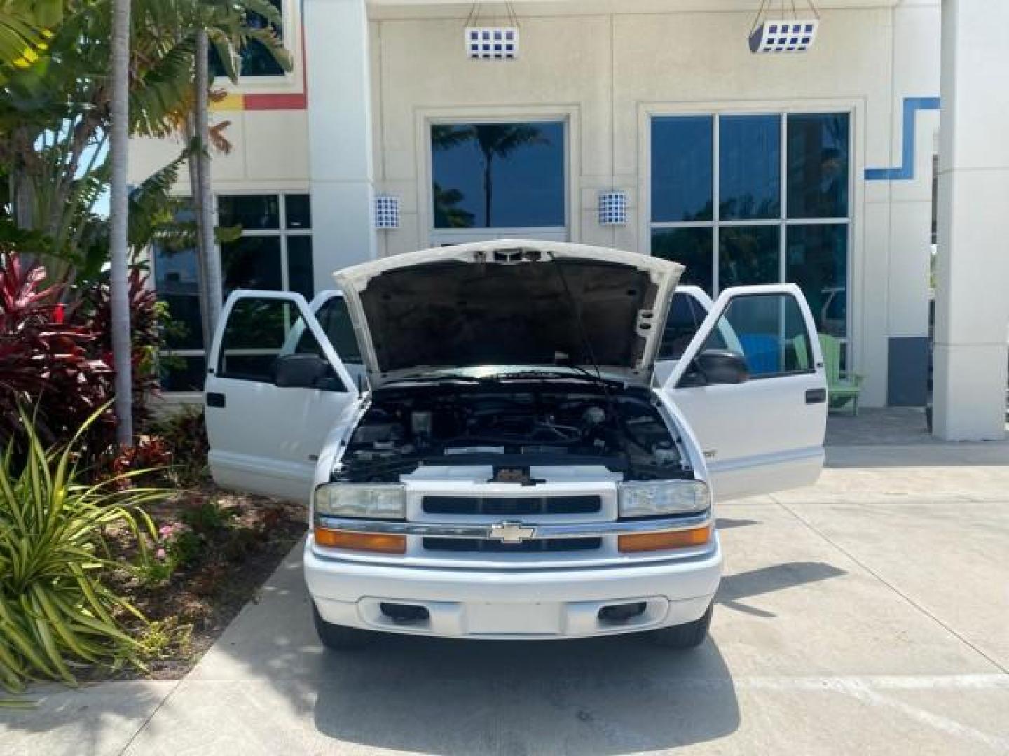 2003 Summit White /Medium Gray Chevrolet Blazer LS 4WD LOW MILES 71,072 (1GNDT13X33K) with an 4.3L Vortec 4300 V6 MFI Engine engine, Automatic transmission, located at 4701 North Dixie Hwy, Pompano Beach, FL, 33064, (954) 422-2889, 26.240938, -80.123474 - OUR WEBPAGE FLORIDACARS1.COM HAS OVER 100 PHOTOS AND FREE CARFAX LINK 2003 CHEVROLET BLAZER LS VIN: 1GNDT13X33K114534 1 G N D T 1 3 X 3 3 K 1 1 4 5 3 4 4 DOOR WAGON/SPORT UTILITY 4.3L V6 F OHV 12V GASOLINE REAR WHEEL DRIVE W/ 4X4 Top Features 4WD/AWD Alloy Wheels Cloth Seats Basic Features ABS Brake - Photo#16