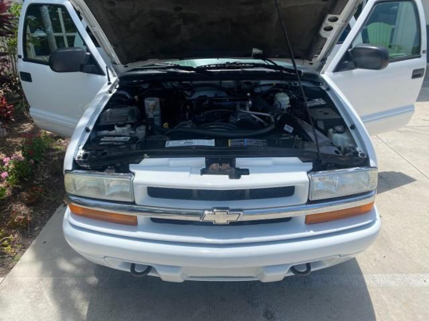 2003 Summit White /Medium Gray Chevrolet Blazer LS 4WD LOW MILES 71,072 (1GNDT13X33K) with an 4.3L Vortec 4300 V6 MFI Engine engine, Automatic transmission, located at 4701 North Dixie Hwy, Pompano Beach, FL, 33064, (954) 422-2889, 26.240938, -80.123474 - OUR WEBPAGE FLORIDACARS1.COM HAS OVER 100 PHOTOS AND FREE CARFAX LINK 2003 CHEVROLET BLAZER LS VIN: 1GNDT13X33K114534 1 G N D T 1 3 X 3 3 K 1 1 4 5 3 4 4 DOOR WAGON/SPORT UTILITY 4.3L V6 F OHV 12V GASOLINE REAR WHEEL DRIVE W/ 4X4 Top Features 4WD/AWD Alloy Wheels Cloth Seats Basic Features ABS Brake - Photo#17
