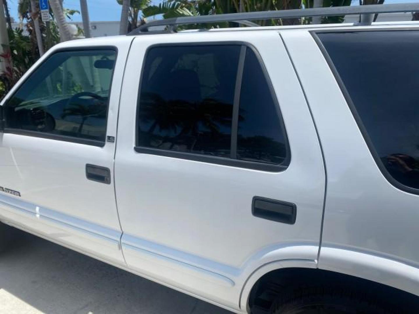 2003 Summit White /Medium Gray Chevrolet Blazer LS 4WD LOW MILES 71,072 (1GNDT13X33K) with an 4.3L Vortec 4300 V6 MFI Engine engine, Automatic transmission, located at 4701 North Dixie Hwy, Pompano Beach, FL, 33064, (954) 422-2889, 26.240938, -80.123474 - OUR WEBPAGE FLORIDACARS1.COM HAS OVER 100 PHOTOS AND FREE CARFAX LINK 2003 CHEVROLET BLAZER LS VIN: 1GNDT13X33K114534 1 G N D T 1 3 X 3 3 K 1 1 4 5 3 4 4 DOOR WAGON/SPORT UTILITY 4.3L V6 F OHV 12V GASOLINE REAR WHEEL DRIVE W/ 4X4 Top Features 4WD/AWD Alloy Wheels Cloth Seats Basic Features ABS Brake - Photo#60