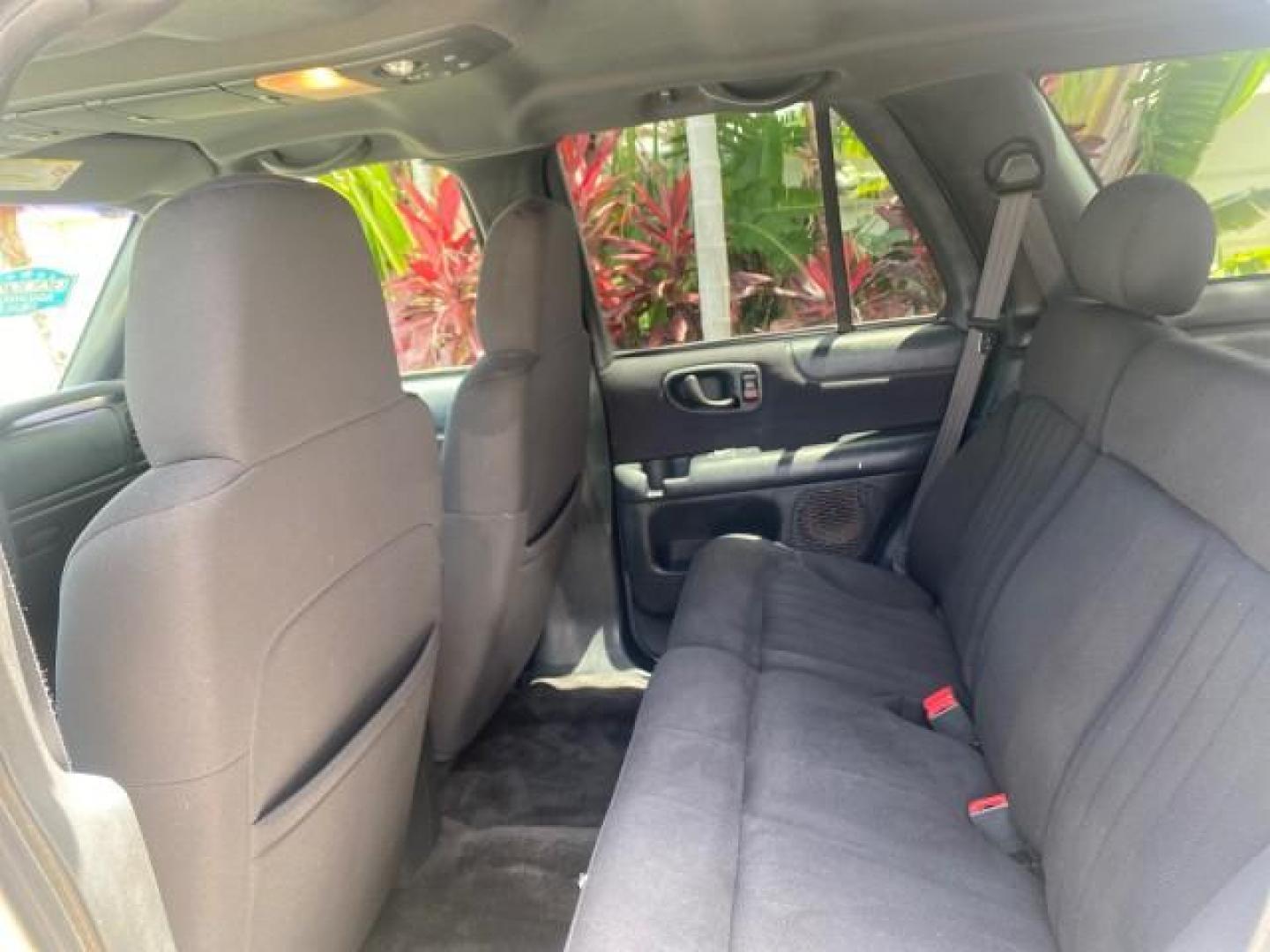 2003 Summit White /Medium Gray Chevrolet Blazer LS 4WD LOW MILES 71,072 (1GNDT13X33K) with an 4.3L Vortec 4300 V6 MFI Engine engine, Automatic transmission, located at 4701 North Dixie Hwy, Pompano Beach, FL, 33064, (954) 422-2889, 26.240938, -80.123474 - OUR WEBPAGE FLORIDACARS1.COM HAS OVER 100 PHOTOS AND FREE CARFAX LINK 2003 CHEVROLET BLAZER LS VIN: 1GNDT13X33K114534 1 G N D T 1 3 X 3 3 K 1 1 4 5 3 4 4 DOOR WAGON/SPORT UTILITY 4.3L V6 F OHV 12V GASOLINE REAR WHEEL DRIVE W/ 4X4 Top Features 4WD/AWD Alloy Wheels Cloth Seats Basic Features ABS Brake - Photo#65