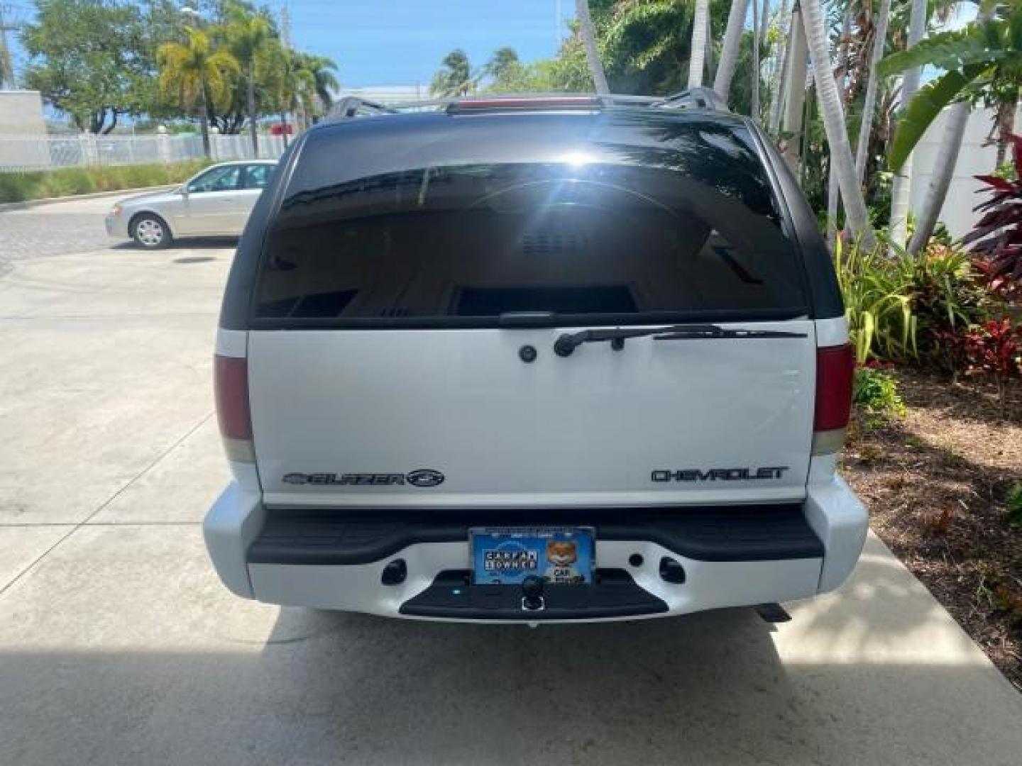 2003 Summit White /Medium Gray Chevrolet Blazer LS 4WD LOW MILES 71,072 (1GNDT13X33K) with an 4.3L Vortec 4300 V6 MFI Engine engine, Automatic transmission, located at 4701 North Dixie Hwy, Pompano Beach, FL, 33064, (954) 422-2889, 26.240938, -80.123474 - OUR WEBPAGE FLORIDACARS1.COM HAS OVER 100 PHOTOS AND FREE CARFAX LINK 2003 CHEVROLET BLAZER LS VIN: 1GNDT13X33K114534 1 G N D T 1 3 X 3 3 K 1 1 4 5 3 4 4 DOOR WAGON/SPORT UTILITY 4.3L V6 F OHV 12V GASOLINE REAR WHEEL DRIVE W/ 4X4 Top Features 4WD/AWD Alloy Wheels Cloth Seats Basic Features ABS Brake - Photo#77