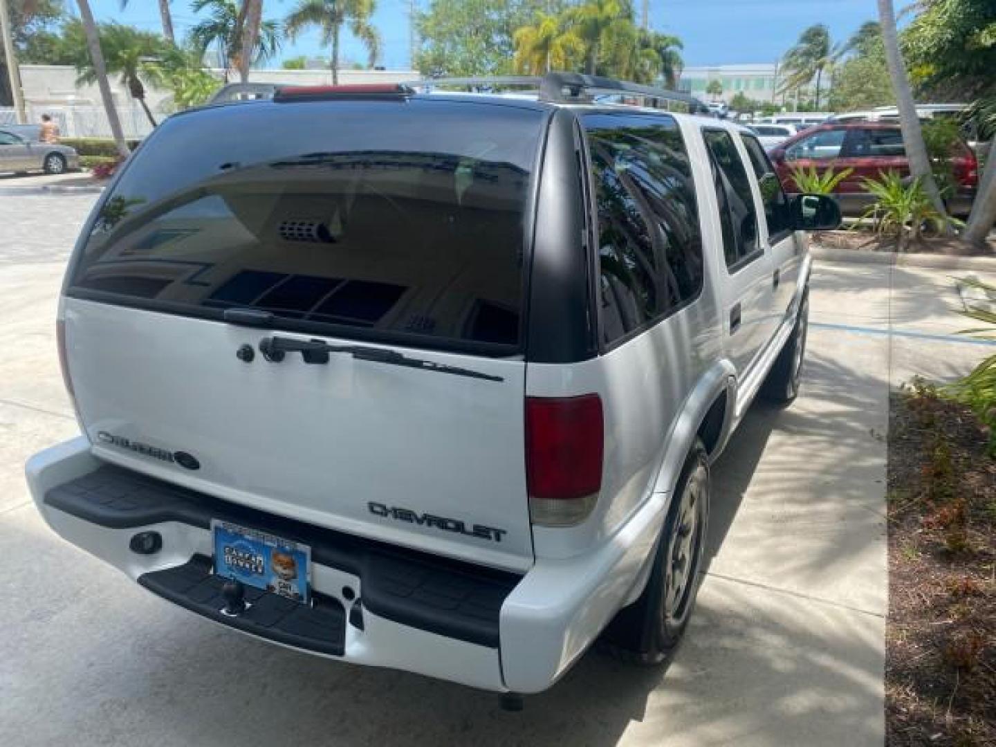2003 Summit White /Medium Gray Chevrolet Blazer LS 4WD LOW MILES 71,072 (1GNDT13X33K) with an 4.3L Vortec 4300 V6 MFI Engine engine, Automatic transmission, located at 4701 North Dixie Hwy, Pompano Beach, FL, 33064, (954) 422-2889, 26.240938, -80.123474 - OUR WEBPAGE FLORIDACARS1.COM HAS OVER 100 PHOTOS AND FREE CARFAX LINK 2003 CHEVROLET BLAZER LS VIN: 1GNDT13X33K114534 1 G N D T 1 3 X 3 3 K 1 1 4 5 3 4 4 DOOR WAGON/SPORT UTILITY 4.3L V6 F OHV 12V GASOLINE REAR WHEEL DRIVE W/ 4X4 Top Features 4WD/AWD Alloy Wheels Cloth Seats Basic Features ABS Brake - Photo#78