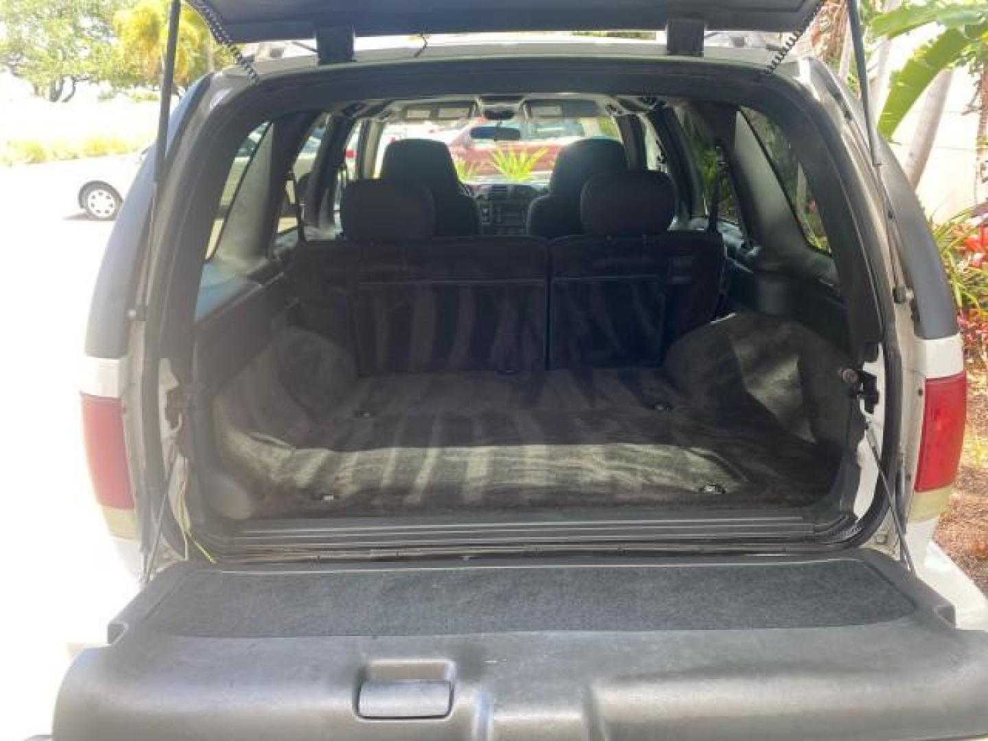 2003 Summit White /Medium Gray Chevrolet Blazer LS 4WD LOW MILES 71,072 (1GNDT13X33K) with an 4.3L Vortec 4300 V6 MFI Engine engine, Automatic transmission, located at 4701 North Dixie Hwy, Pompano Beach, FL, 33064, (954) 422-2889, 26.240938, -80.123474 - OUR WEBPAGE FLORIDACARS1.COM HAS OVER 100 PHOTOS AND FREE CARFAX LINK 2003 CHEVROLET BLAZER LS VIN: 1GNDT13X33K114534 1 G N D T 1 3 X 3 3 K 1 1 4 5 3 4 4 DOOR WAGON/SPORT UTILITY 4.3L V6 F OHV 12V GASOLINE REAR WHEEL DRIVE W/ 4X4 Top Features 4WD/AWD Alloy Wheels Cloth Seats Basic Features ABS Brake - Photo#80
