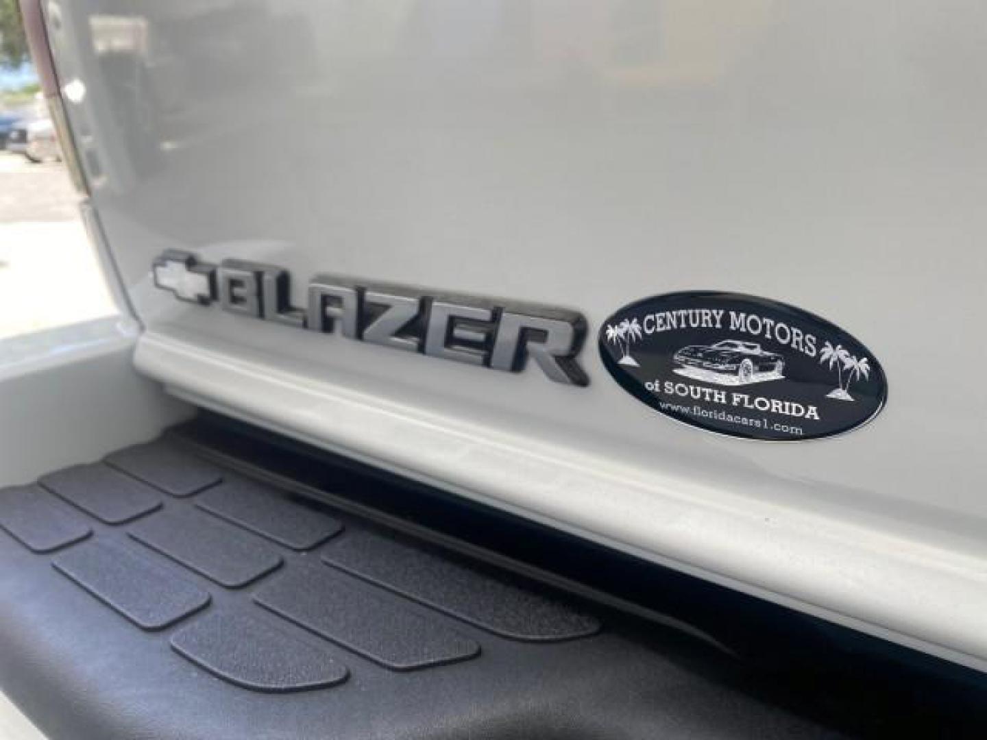 2003 Summit White /Medium Gray Chevrolet Blazer LS 4WD LOW MILES 71,072 (1GNDT13X33K) with an 4.3L Vortec 4300 V6 MFI Engine engine, Automatic transmission, located at 4701 North Dixie Hwy, Pompano Beach, FL, 33064, (954) 422-2889, 26.240938, -80.123474 - OUR WEBPAGE FLORIDACARS1.COM HAS OVER 100 PHOTOS AND FREE CARFAX LINK 2003 CHEVROLET BLAZER LS VIN: 1GNDT13X33K114534 1 G N D T 1 3 X 3 3 K 1 1 4 5 3 4 4 DOOR WAGON/SPORT UTILITY 4.3L V6 F OHV 12V GASOLINE REAR WHEEL DRIVE W/ 4X4 Top Features 4WD/AWD Alloy Wheels Cloth Seats Basic Features ABS Brake - Photo#85