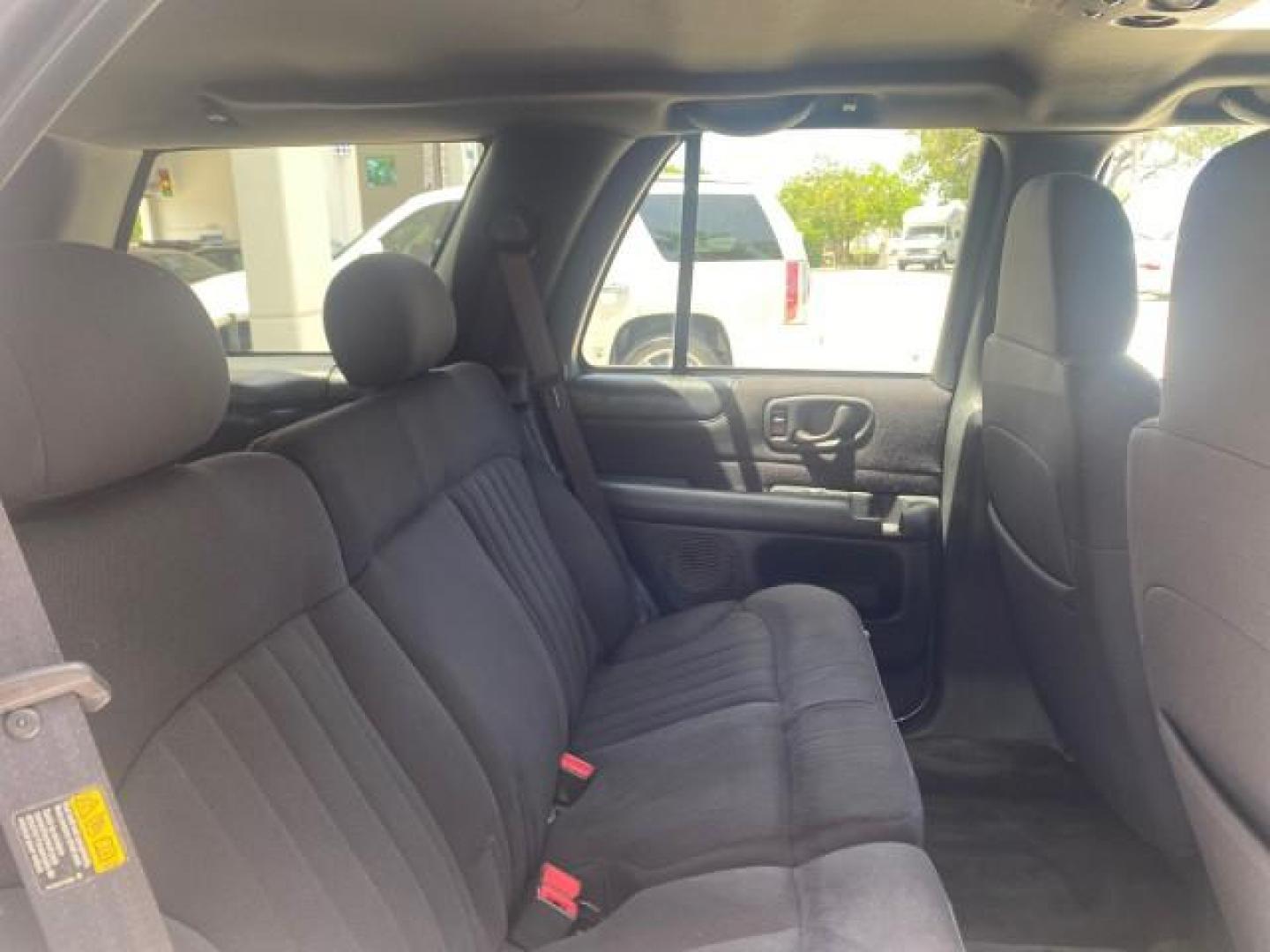 2003 Summit White /Medium Gray Chevrolet Blazer LS 4WD LOW MILES 71,072 (1GNDT13X33K) with an 4.3L Vortec 4300 V6 MFI Engine engine, Automatic transmission, located at 4701 North Dixie Hwy, Pompano Beach, FL, 33064, (954) 422-2889, 26.240938, -80.123474 - OUR WEBPAGE FLORIDACARS1.COM HAS OVER 100 PHOTOS AND FREE CARFAX LINK 2003 CHEVROLET BLAZER LS VIN: 1GNDT13X33K114534 1 G N D T 1 3 X 3 3 K 1 1 4 5 3 4 4 DOOR WAGON/SPORT UTILITY 4.3L V6 F OHV 12V GASOLINE REAR WHEEL DRIVE W/ 4X4 Top Features 4WD/AWD Alloy Wheels Cloth Seats Basic Features ABS Brake - Photo#94