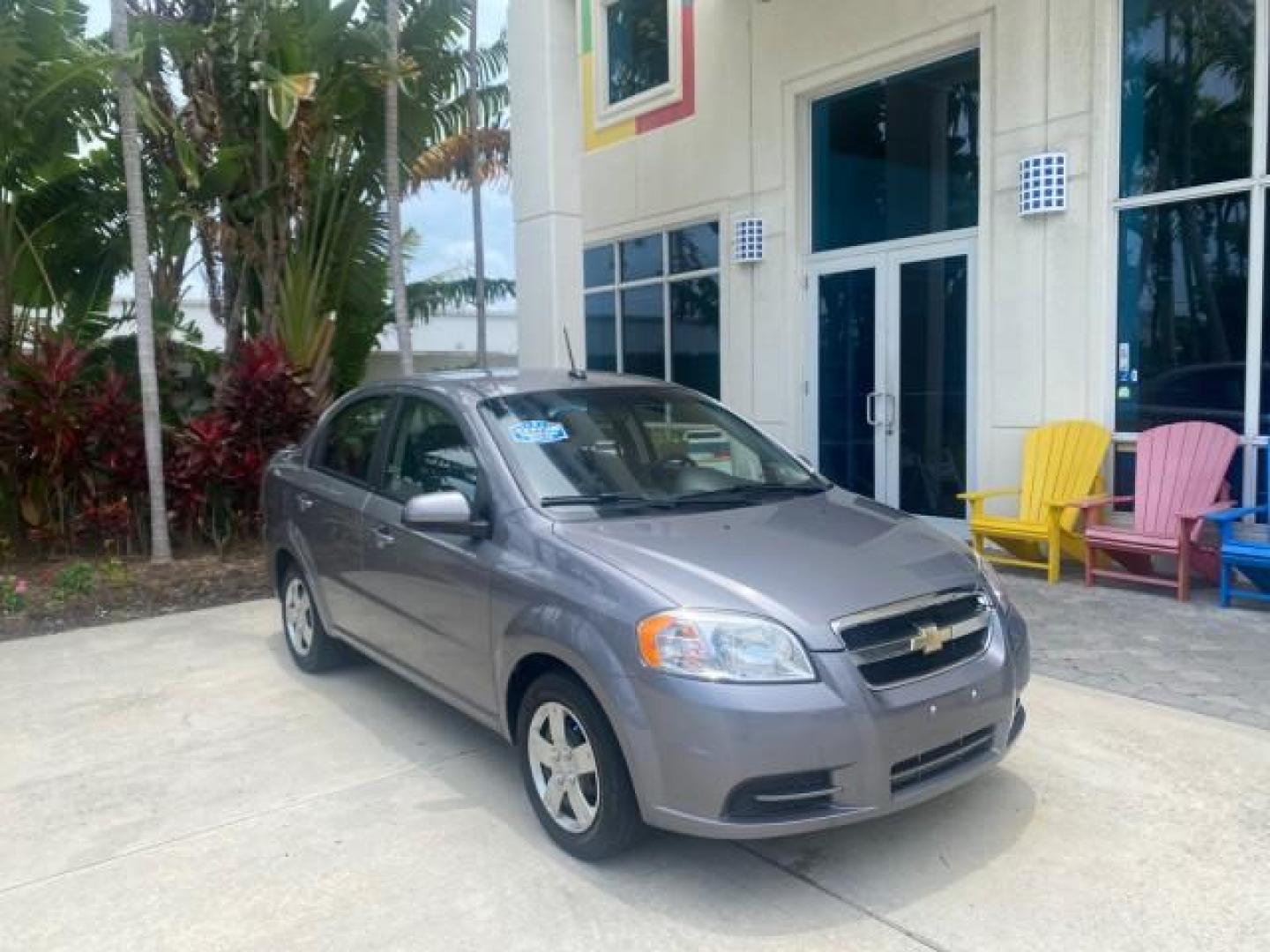 2011 Medium Gray /Charcoal Chevrolet Aveo LS LOW MILES 18,701 (KL1TD5DE5BB) with an Ecotec 1.6L DOHC 16-Valve 4-Cyl MFI Engine engine, Automatic transmission, located at 4701 North Dixie Hwy, Pompano Beach, FL, 33064, (954) 422-2889, 26.240938, -80.123474 - OUR WEBPAGE FLORIDACARS1.COM HAS OVER 100 PHOTOS AND FREE CARFAX LINK 2011 CHEVROLET AVEO LT VIN: KL1TD5DE5BB141987 K L 1 T D 5 D E 5 B B 1 4 1 9 8 7 SEDAN 4 DR 1.6L I4 F DOHC 16V GASOLINE 35 MPG FRONT WHEEL DRIVE Top Features Cloth Seats Basic Features AM/FM Stereo Automatic Transmission Cruise Con - Photo#1