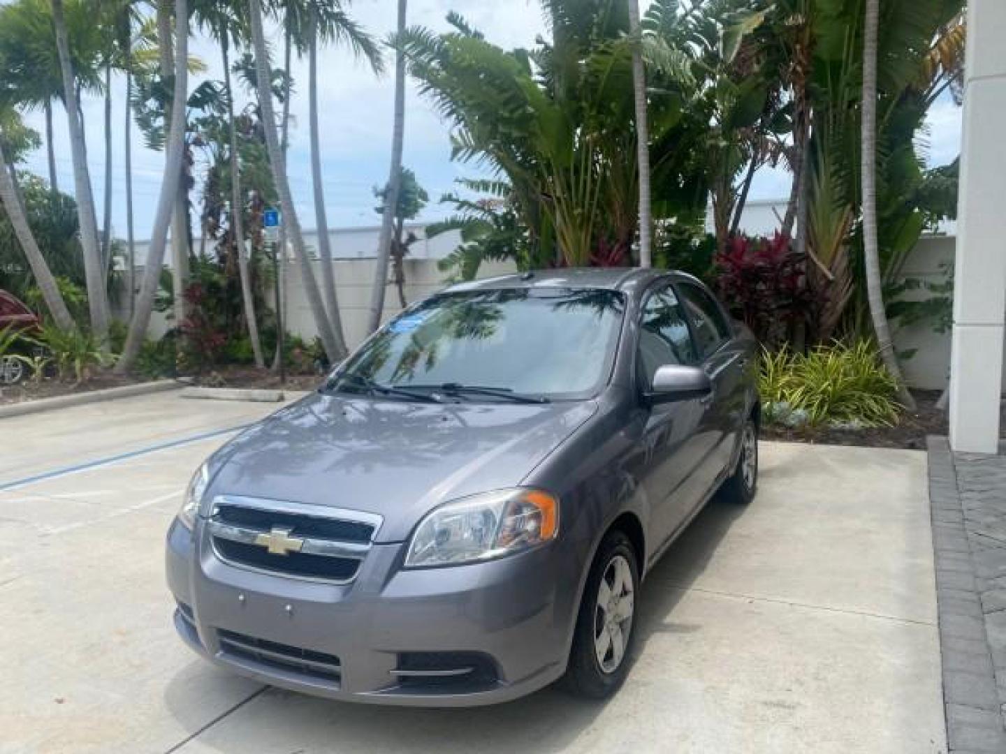 2011 Medium Gray /Charcoal Chevrolet Aveo LS LOW MILES 18,701 (KL1TD5DE5BB) with an Ecotec 1.6L DOHC 16-Valve 4-Cyl MFI Engine engine, Automatic transmission, located at 4701 North Dixie Hwy, Pompano Beach, FL, 33064, (954) 422-2889, 26.240938, -80.123474 - OUR WEBPAGE FLORIDACARS1.COM HAS OVER 100 PHOTOS AND FREE CARFAX LINK 2011 CHEVROLET AVEO LT VIN: KL1TD5DE5BB141987 K L 1 T D 5 D E 5 B B 1 4 1 9 8 7 SEDAN 4 DR 1.6L I4 F DOHC 16V GASOLINE 35 MPG FRONT WHEEL DRIVE Top Features Cloth Seats Basic Features AM/FM Stereo Automatic Transmission Cruise Con - Photo#3