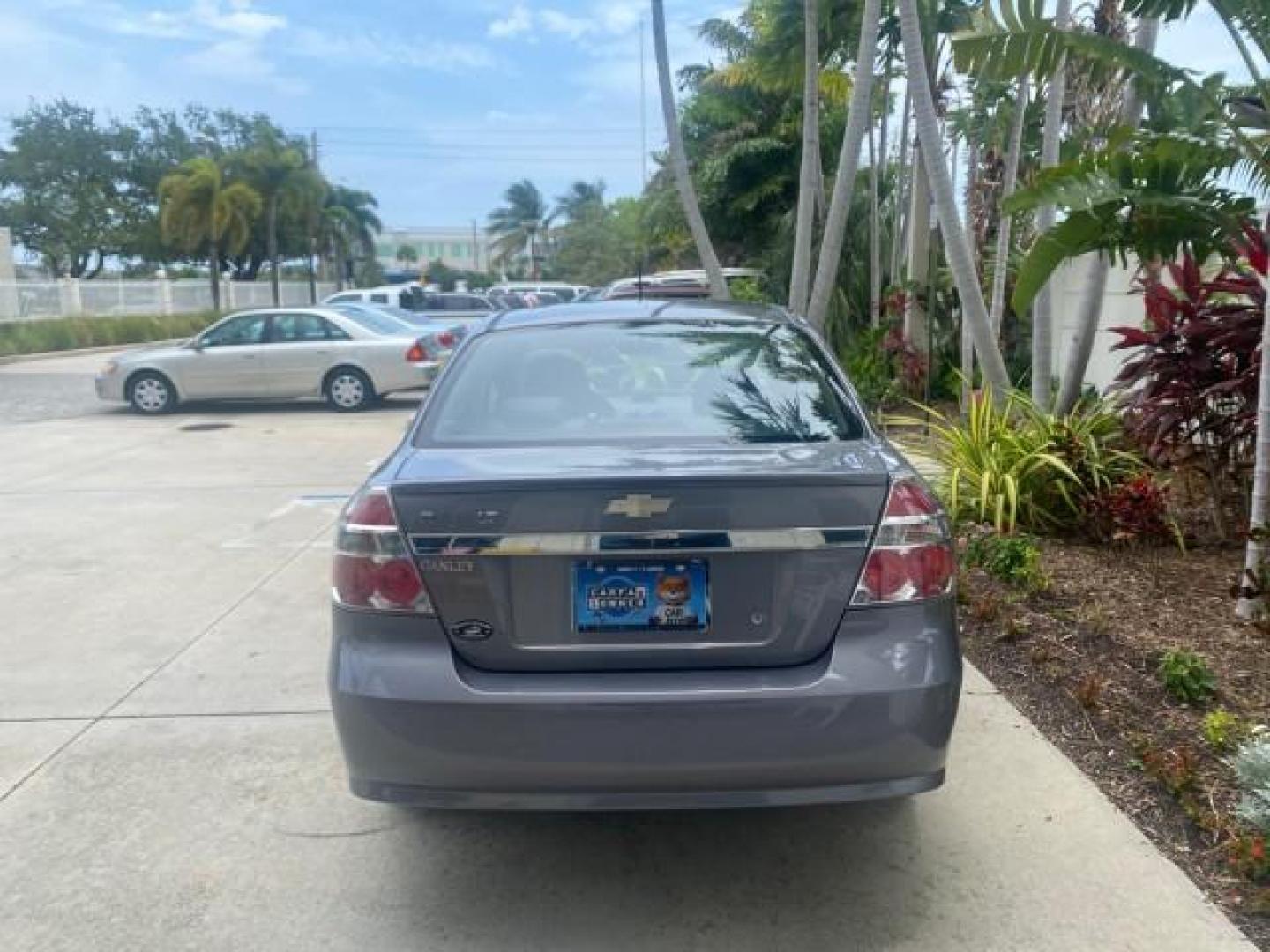 2011 Medium Gray /Charcoal Chevrolet Aveo LS LOW MILES 18,701 (KL1TD5DE5BB) with an Ecotec 1.6L DOHC 16-Valve 4-Cyl MFI Engine engine, Automatic transmission, located at 4701 North Dixie Hwy, Pompano Beach, FL, 33064, (954) 422-2889, 26.240938, -80.123474 - OUR WEBPAGE FLORIDACARS1.COM HAS OVER 100 PHOTOS AND FREE CARFAX LINK 2011 CHEVROLET AVEO LT VIN: KL1TD5DE5BB141987 K L 1 T D 5 D E 5 B B 1 4 1 9 8 7 SEDAN 4 DR 1.6L I4 F DOHC 16V GASOLINE 35 MPG FRONT WHEEL DRIVE Top Features Cloth Seats Basic Features AM/FM Stereo Automatic Transmission Cruise Con - Photo#6