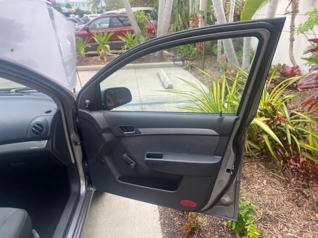 2011 Medium Gray /Charcoal Chevrolet Aveo LS LOW MILES 18,766 (KL1TD5DE5BB) with an Ecotec 1.6L DOHC 16-Valve 4-Cyl MFI Engine engine, Automatic transmission, located at 4701 North Dixie Hwy, Pompano Beach, FL, 33064, (954) 422-2889, 26.240938, -80.123474 - OUR WEBPAGE FLORIDACARS1.COM HAS OVER 100 PHOTOS AND FREE CARFAX LINK 2011 CHEVROLET AVEO LT VIN: KL1TD5DE5BB141987 K L 1 T D 5 D E 5 B B 1 4 1 9 8 7 SEDAN 4 DR 1.6L I4 F DOHC 16V GASOLINE 35 MPG FRONT WHEEL DRIVE Top Features Cloth Seats Basic Features AM/FM Stereo Automatic Transmission Cruise Con - Photo#11