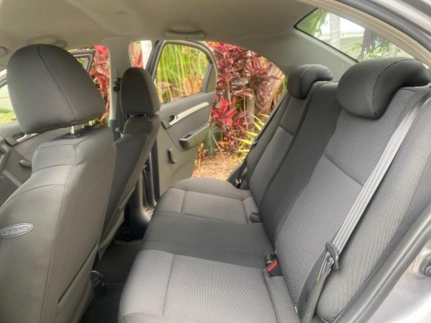 2011 Medium Gray /Charcoal Chevrolet Aveo LS LOW MILES 18,701 (KL1TD5DE5BB) with an Ecotec 1.6L DOHC 16-Valve 4-Cyl MFI Engine engine, Automatic transmission, located at 4701 North Dixie Hwy, Pompano Beach, FL, 33064, (954) 422-2889, 26.240938, -80.123474 - OUR WEBPAGE FLORIDACARS1.COM HAS OVER 100 PHOTOS AND FREE CARFAX LINK 2011 CHEVROLET AVEO LT VIN: KL1TD5DE5BB141987 K L 1 T D 5 D E 5 B B 1 4 1 9 8 7 SEDAN 4 DR 1.6L I4 F DOHC 16V GASOLINE 35 MPG FRONT WHEEL DRIVE Top Features Cloth Seats Basic Features AM/FM Stereo Automatic Transmission Cruise Con - Photo#14