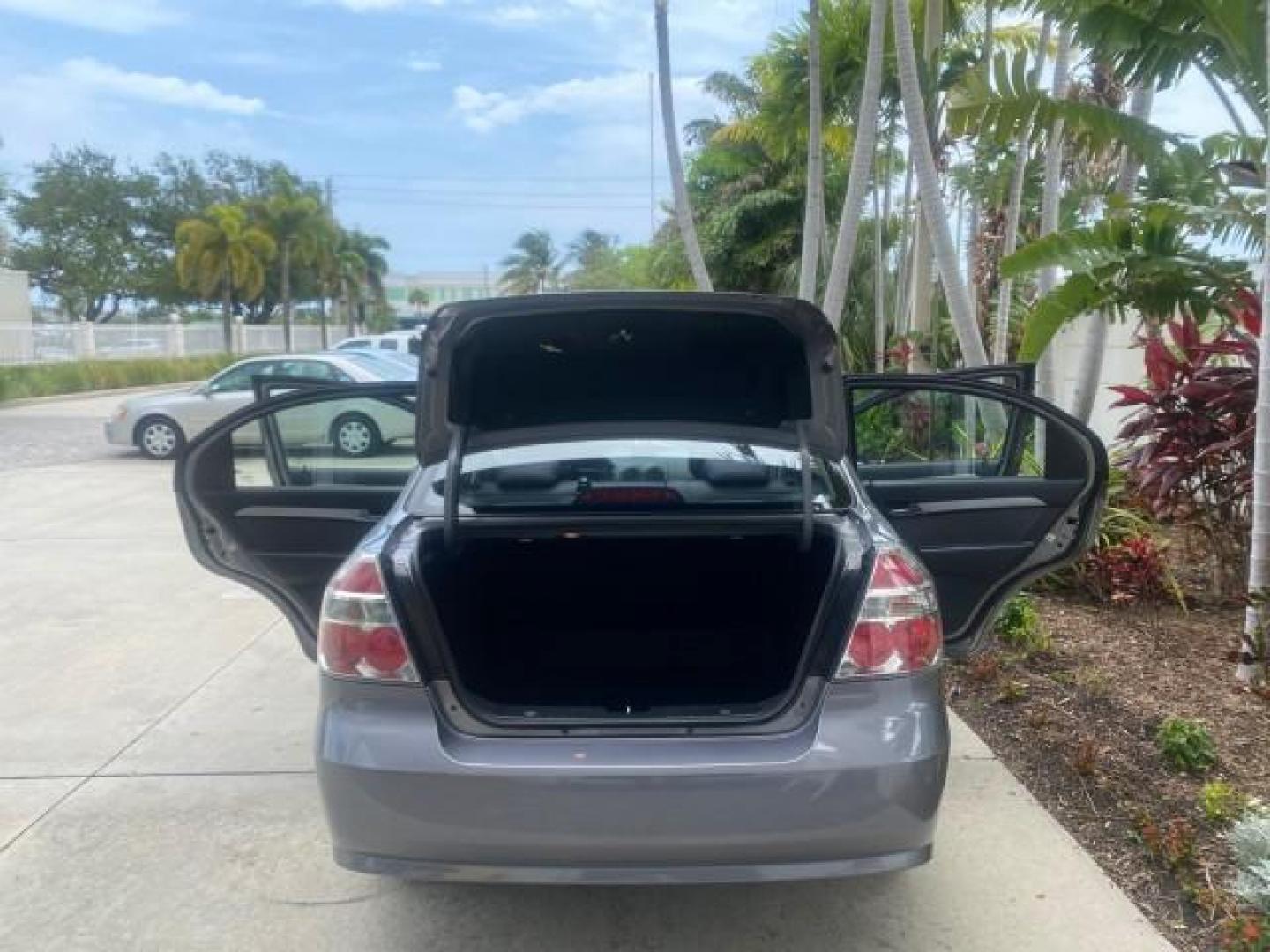 2011 Medium Gray /Charcoal Chevrolet Aveo LS LOW MILES 18,701 (KL1TD5DE5BB) with an Ecotec 1.6L DOHC 16-Valve 4-Cyl MFI Engine engine, Automatic transmission, located at 4701 North Dixie Hwy, Pompano Beach, FL, 33064, (954) 422-2889, 26.240938, -80.123474 - OUR WEBPAGE FLORIDACARS1.COM HAS OVER 100 PHOTOS AND FREE CARFAX LINK 2011 CHEVROLET AVEO LT VIN: KL1TD5DE5BB141987 K L 1 T D 5 D E 5 B B 1 4 1 9 8 7 SEDAN 4 DR 1.6L I4 F DOHC 16V GASOLINE 35 MPG FRONT WHEEL DRIVE Top Features Cloth Seats Basic Features AM/FM Stereo Automatic Transmission Cruise Con - Photo#15