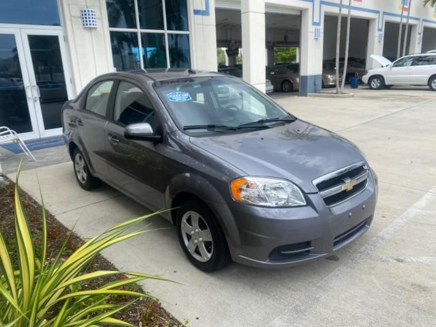 2011 Medium Gray /Charcoal Chevrolet Aveo LS LOW MILES 18,701 (KL1TD5DE5BB) with an Ecotec 1.6L DOHC 16-Valve 4-Cyl MFI Engine engine, Automatic transmission, located at 4701 North Dixie Hwy, Pompano Beach, FL, 33064, (954) 422-2889, 26.240938, -80.123474 - OUR WEBPAGE FLORIDACARS1.COM HAS OVER 100 PHOTOS AND FREE CARFAX LINK 2011 CHEVROLET AVEO LT VIN: KL1TD5DE5BB141987 K L 1 T D 5 D E 5 B B 1 4 1 9 8 7 SEDAN 4 DR 1.6L I4 F DOHC 16V GASOLINE 35 MPG FRONT WHEEL DRIVE Top Features Cloth Seats Basic Features AM/FM Stereo Automatic Transmission Cruise Con - Photo#24