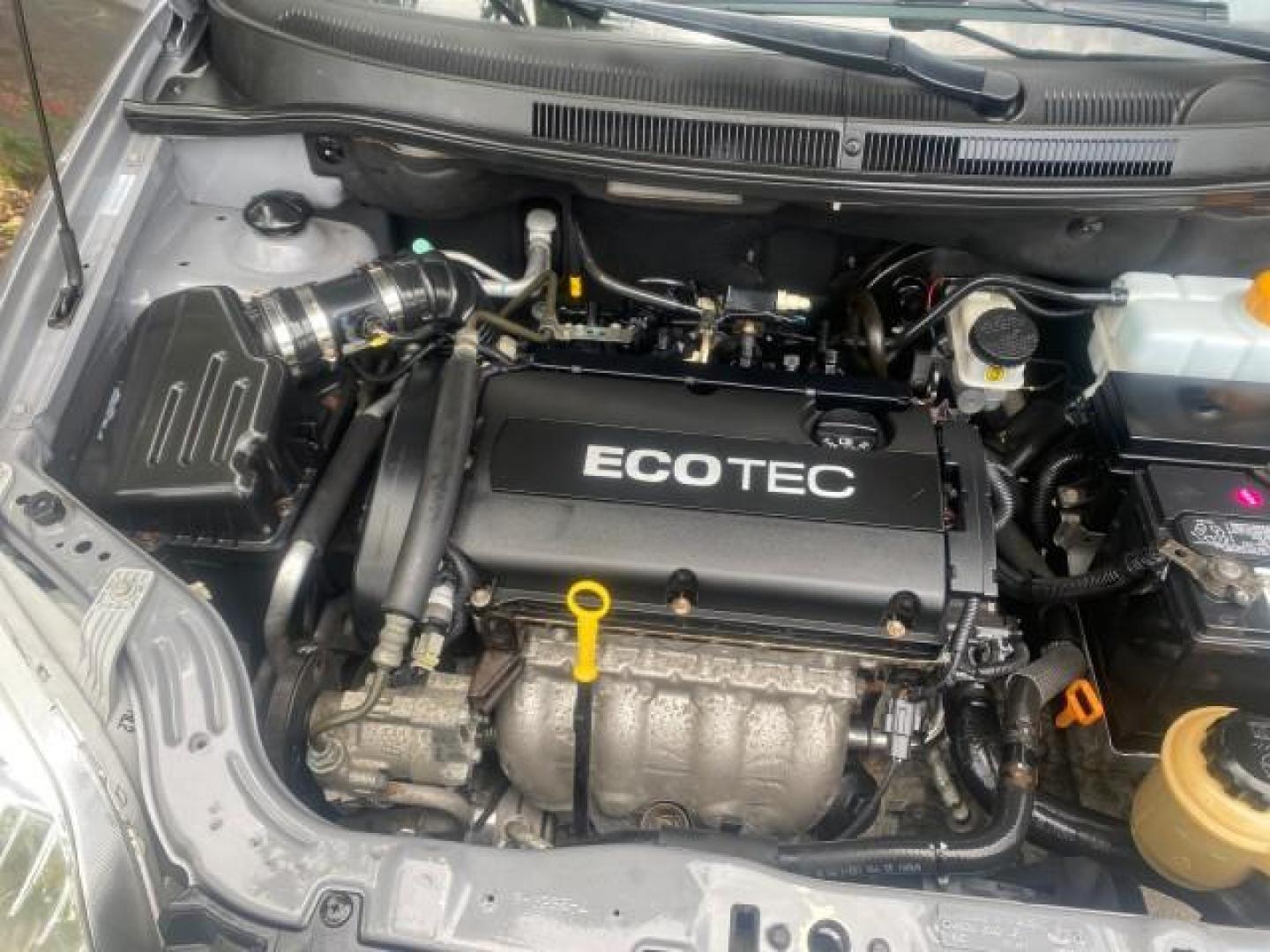 2011 Medium Gray /Charcoal Chevrolet Aveo LS LOW MILES 18,701 (KL1TD5DE5BB) with an Ecotec 1.6L DOHC 16-Valve 4-Cyl MFI Engine engine, Automatic transmission, located at 4701 North Dixie Hwy, Pompano Beach, FL, 33064, (954) 422-2889, 26.240938, -80.123474 - OUR WEBPAGE FLORIDACARS1.COM HAS OVER 100 PHOTOS AND FREE CARFAX LINK 2011 CHEVROLET AVEO LT VIN: KL1TD5DE5BB141987 K L 1 T D 5 D E 5 B B 1 4 1 9 8 7 SEDAN 4 DR 1.6L I4 F DOHC 16V GASOLINE 35 MPG FRONT WHEEL DRIVE Top Features Cloth Seats Basic Features AM/FM Stereo Automatic Transmission Cruise Con - Photo#25