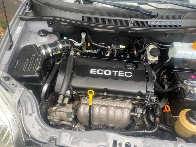 2011 Medium Gray /Charcoal Chevrolet Aveo LS LOW MILES 18,766 (KL1TD5DE5BB) with an Ecotec 1.6L DOHC 16-Valve 4-Cyl MFI Engine engine, Automatic transmission, located at 4701 North Dixie Hwy, Pompano Beach, FL, 33064, (954) 422-2889, 26.240938, -80.123474 - OUR WEBPAGE FLORIDACARS1.COM HAS OVER 100 PHOTOS AND FREE CARFAX LINK 2011 CHEVROLET AVEO LT VIN: KL1TD5DE5BB141987 K L 1 T D 5 D E 5 B B 1 4 1 9 8 7 SEDAN 4 DR 1.6L I4 F DOHC 16V GASOLINE 35 MPG FRONT WHEEL DRIVE Top Features Cloth Seats Basic Features AM/FM Stereo Automatic Transmission Cruise Con - Photo#25