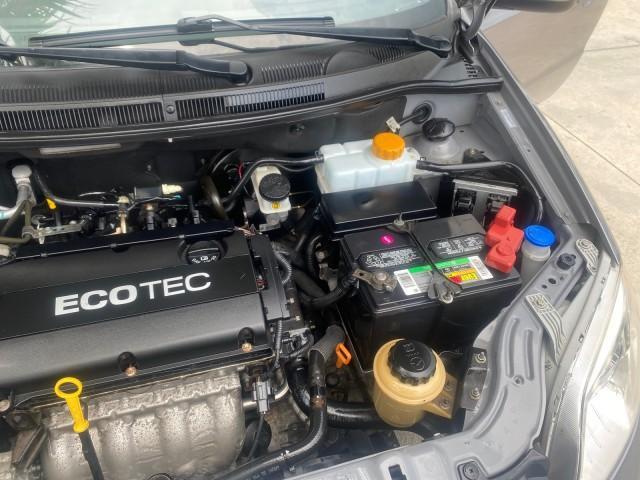 2011 Medium Gray /Charcoal Chevrolet Aveo LS LOW MILES 18,766 (KL1TD5DE5BB) with an Ecotec 1.6L DOHC 16-Valve 4-Cyl MFI Engine engine, Automatic transmission, located at 4701 North Dixie Hwy, Pompano Beach, FL, 33064, (954) 422-2889, 26.240938, -80.123474 - OUR WEBPAGE FLORIDACARS1.COM HAS OVER 100 PHOTOS AND FREE CARFAX LINK 2011 CHEVROLET AVEO LT VIN: KL1TD5DE5BB141987 K L 1 T D 5 D E 5 B B 1 4 1 9 8 7 SEDAN 4 DR 1.6L I4 F DOHC 16V GASOLINE 35 MPG FRONT WHEEL DRIVE Top Features Cloth Seats Basic Features AM/FM Stereo Automatic Transmission Cruise Con - Photo#26