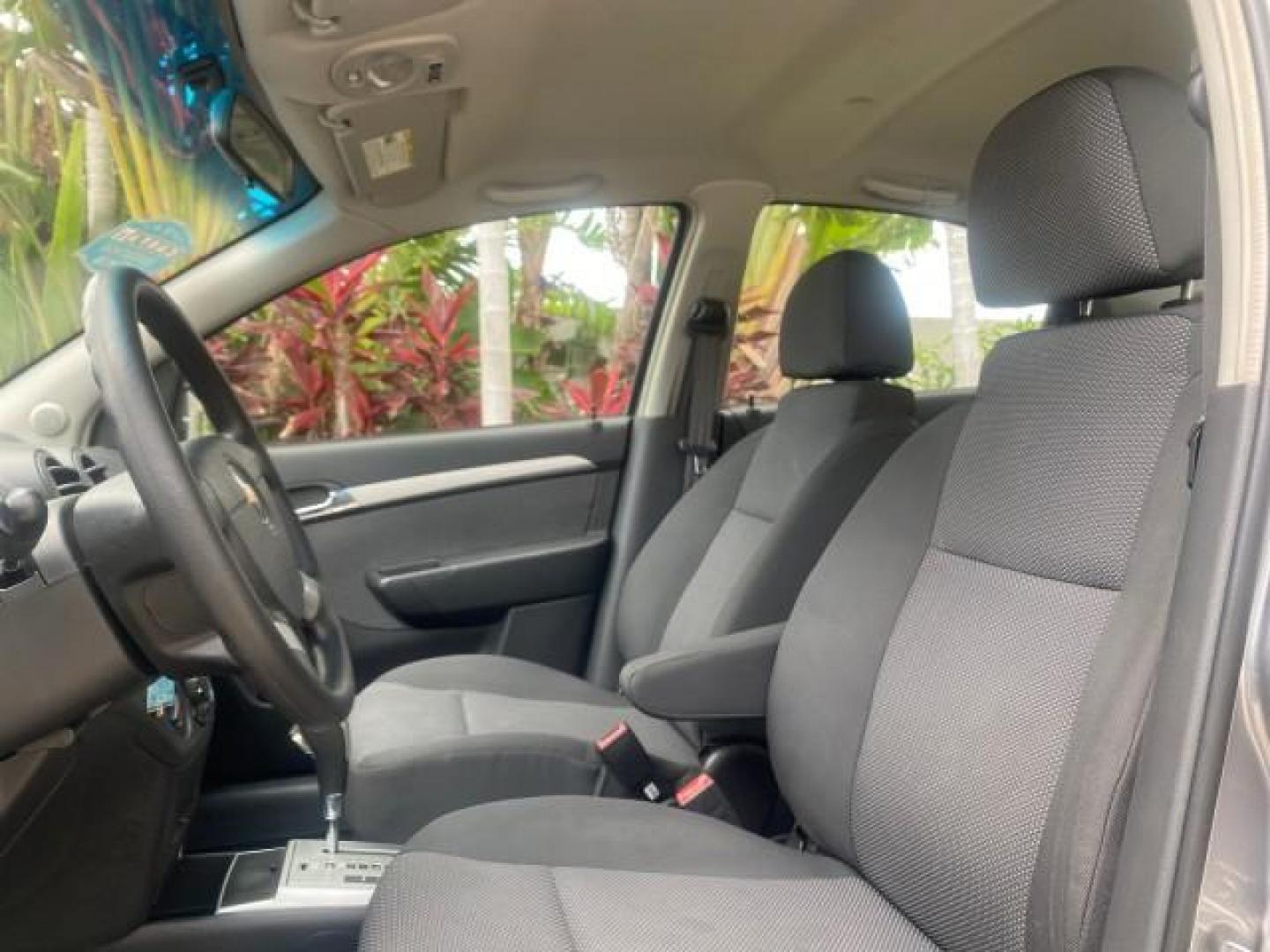 2011 Medium Gray /Charcoal Chevrolet Aveo LS LOW MILES 18,701 (KL1TD5DE5BB) with an Ecotec 1.6L DOHC 16-Valve 4-Cyl MFI Engine engine, Automatic transmission, located at 4701 North Dixie Hwy, Pompano Beach, FL, 33064, (954) 422-2889, 26.240938, -80.123474 - OUR WEBPAGE FLORIDACARS1.COM HAS OVER 100 PHOTOS AND FREE CARFAX LINK 2011 CHEVROLET AVEO LT VIN: KL1TD5DE5BB141987 K L 1 T D 5 D E 5 B B 1 4 1 9 8 7 SEDAN 4 DR 1.6L I4 F DOHC 16V GASOLINE 35 MPG FRONT WHEEL DRIVE Top Features Cloth Seats Basic Features AM/FM Stereo Automatic Transmission Cruise Con - Photo#31