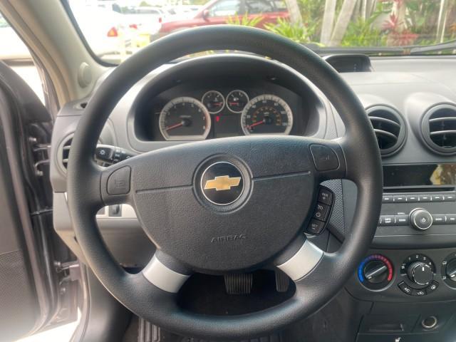 2011 Medium Gray /Charcoal Chevrolet Aveo LS LOW MILES 18,766 (KL1TD5DE5BB) with an Ecotec 1.6L DOHC 16-Valve 4-Cyl MFI Engine engine, Automatic transmission, located at 4701 North Dixie Hwy, Pompano Beach, FL, 33064, (954) 422-2889, 26.240938, -80.123474 - OUR WEBPAGE FLORIDACARS1.COM HAS OVER 100 PHOTOS AND FREE CARFAX LINK 2011 CHEVROLET AVEO LT VIN: KL1TD5DE5BB141987 K L 1 T D 5 D E 5 B B 1 4 1 9 8 7 SEDAN 4 DR 1.6L I4 F DOHC 16V GASOLINE 35 MPG FRONT WHEEL DRIVE Top Features Cloth Seats Basic Features AM/FM Stereo Automatic Transmission Cruise Con - Photo#35
