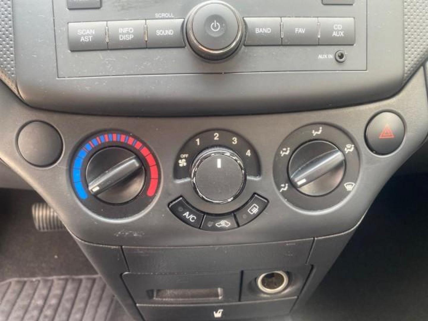2011 Medium Gray /Charcoal Chevrolet Aveo LS LOW MILES 18,701 (KL1TD5DE5BB) with an Ecotec 1.6L DOHC 16-Valve 4-Cyl MFI Engine engine, Automatic transmission, located at 4701 North Dixie Hwy, Pompano Beach, FL, 33064, (954) 422-2889, 26.240938, -80.123474 - OUR WEBPAGE FLORIDACARS1.COM HAS OVER 100 PHOTOS AND FREE CARFAX LINK 2011 CHEVROLET AVEO LT VIN: KL1TD5DE5BB141987 K L 1 T D 5 D E 5 B B 1 4 1 9 8 7 SEDAN 4 DR 1.6L I4 F DOHC 16V GASOLINE 35 MPG FRONT WHEEL DRIVE Top Features Cloth Seats Basic Features AM/FM Stereo Automatic Transmission Cruise Con - Photo#49