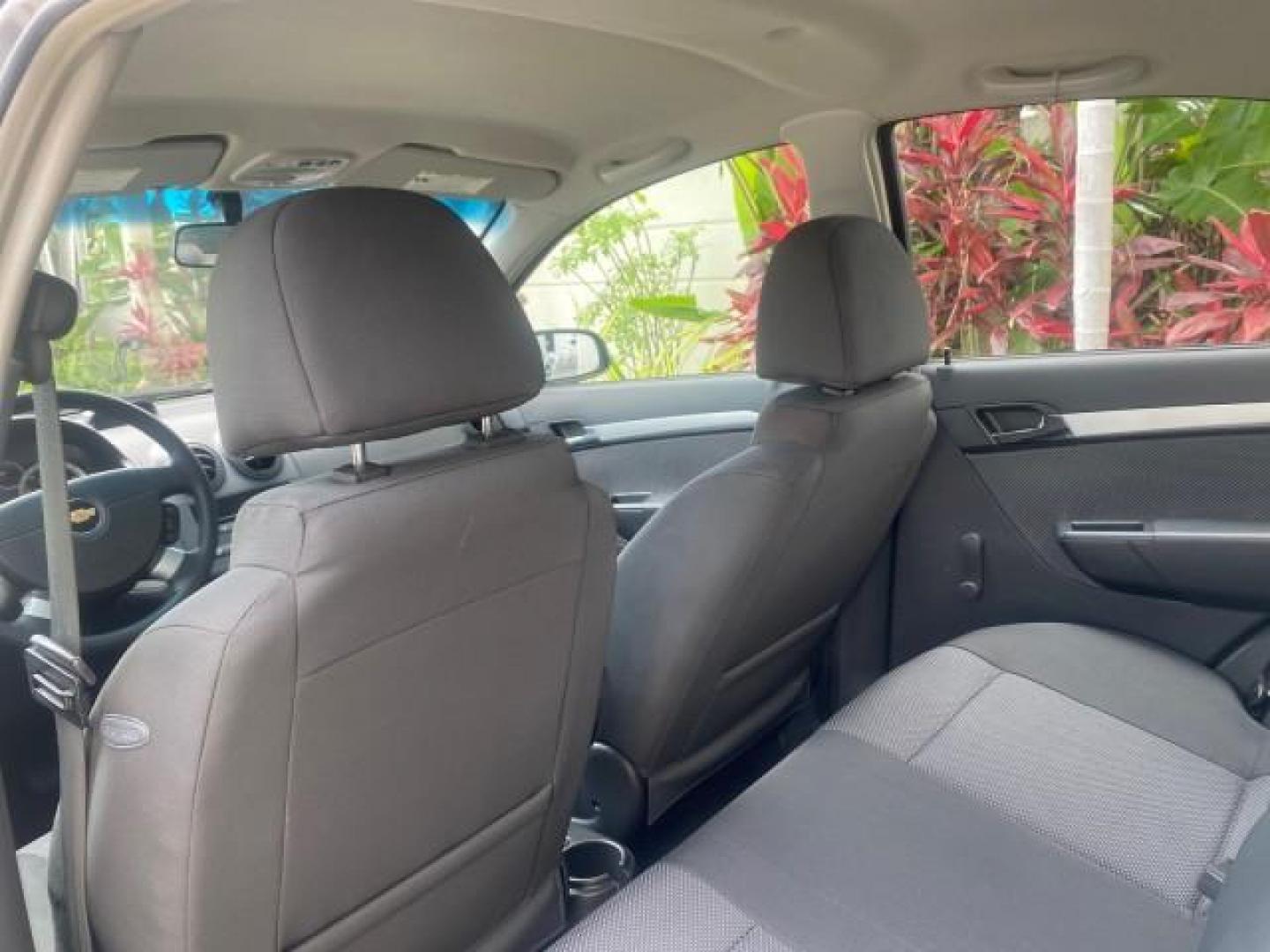 2011 Medium Gray /Charcoal Chevrolet Aveo LS LOW MILES 18,701 (KL1TD5DE5BB) with an Ecotec 1.6L DOHC 16-Valve 4-Cyl MFI Engine engine, Automatic transmission, located at 4701 North Dixie Hwy, Pompano Beach, FL, 33064, (954) 422-2889, 26.240938, -80.123474 - OUR WEBPAGE FLORIDACARS1.COM HAS OVER 100 PHOTOS AND FREE CARFAX LINK 2011 CHEVROLET AVEO LT VIN: KL1TD5DE5BB141987 K L 1 T D 5 D E 5 B B 1 4 1 9 8 7 SEDAN 4 DR 1.6L I4 F DOHC 16V GASOLINE 35 MPG FRONT WHEEL DRIVE Top Features Cloth Seats Basic Features AM/FM Stereo Automatic Transmission Cruise Con - Photo#63