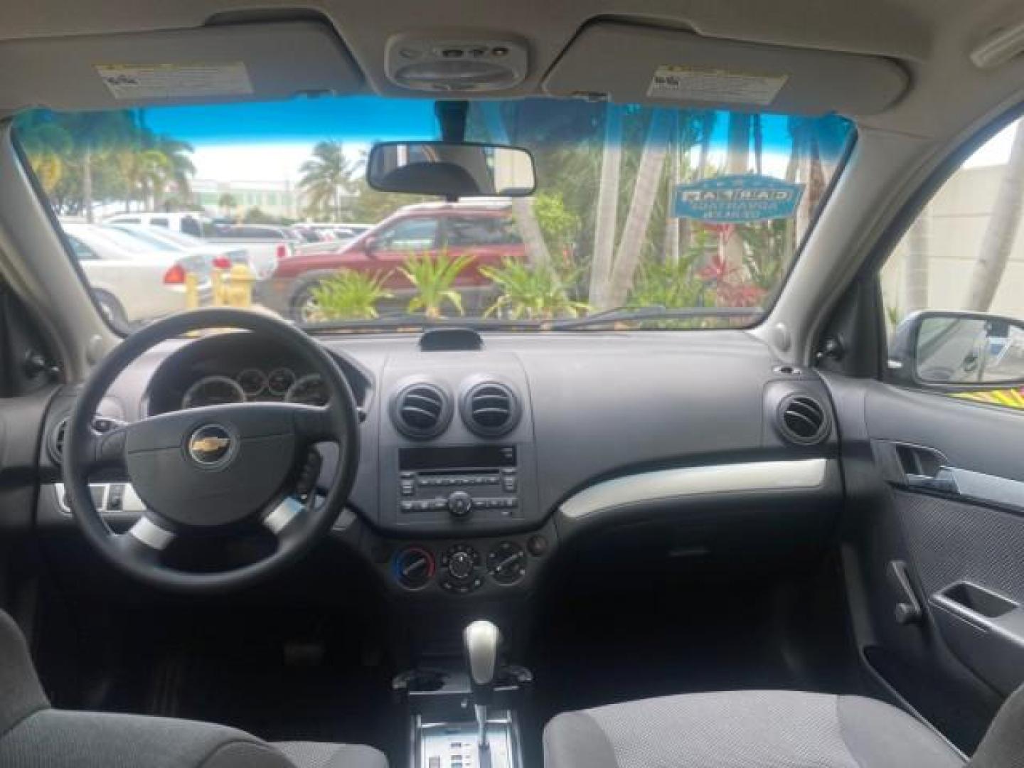 2011 Medium Gray /Charcoal Chevrolet Aveo LS LOW MILES 18,701 (KL1TD5DE5BB) with an Ecotec 1.6L DOHC 16-Valve 4-Cyl MFI Engine engine, Automatic transmission, located at 4701 North Dixie Hwy, Pompano Beach, FL, 33064, (954) 422-2889, 26.240938, -80.123474 - OUR WEBPAGE FLORIDACARS1.COM HAS OVER 100 PHOTOS AND FREE CARFAX LINK 2011 CHEVROLET AVEO LT VIN: KL1TD5DE5BB141987 K L 1 T D 5 D E 5 B B 1 4 1 9 8 7 SEDAN 4 DR 1.6L I4 F DOHC 16V GASOLINE 35 MPG FRONT WHEEL DRIVE Top Features Cloth Seats Basic Features AM/FM Stereo Automatic Transmission Cruise Con - Photo#64