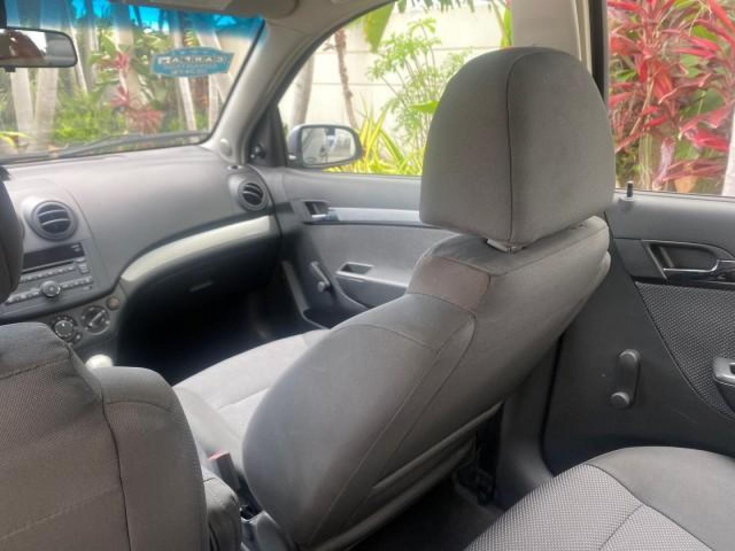 2011 Medium Gray /Charcoal Chevrolet Aveo LS LOW MILES 18,701 (KL1TD5DE5BB) with an Ecotec 1.6L DOHC 16-Valve 4-Cyl MFI Engine engine, Automatic transmission, located at 4701 North Dixie Hwy, Pompano Beach, FL, 33064, (954) 422-2889, 26.240938, -80.123474 - OUR WEBPAGE FLORIDACARS1.COM HAS OVER 100 PHOTOS AND FREE CARFAX LINK 2011 CHEVROLET AVEO LT VIN: KL1TD5DE5BB141987 K L 1 T D 5 D E 5 B B 1 4 1 9 8 7 SEDAN 4 DR 1.6L I4 F DOHC 16V GASOLINE 35 MPG FRONT WHEEL DRIVE Top Features Cloth Seats Basic Features AM/FM Stereo Automatic Transmission Cruise Con - Photo#65