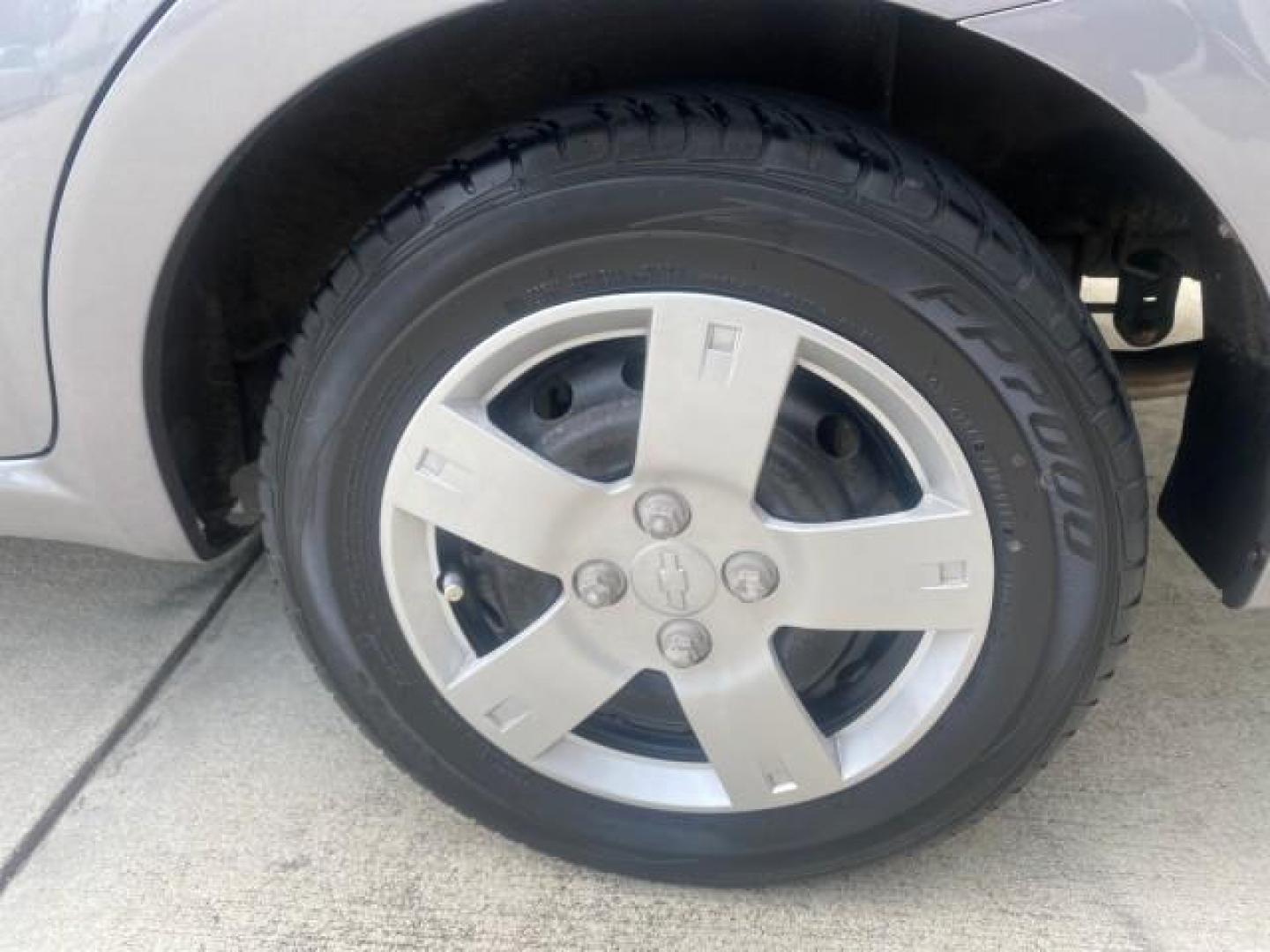 2011 Medium Gray /Charcoal Chevrolet Aveo LS LOW MILES 18,701 (KL1TD5DE5BB) with an Ecotec 1.6L DOHC 16-Valve 4-Cyl MFI Engine engine, Automatic transmission, located at 4701 North Dixie Hwy, Pompano Beach, FL, 33064, (954) 422-2889, 26.240938, -80.123474 - OUR WEBPAGE FLORIDACARS1.COM HAS OVER 100 PHOTOS AND FREE CARFAX LINK 2011 CHEVROLET AVEO LT VIN: KL1TD5DE5BB141987 K L 1 T D 5 D E 5 B B 1 4 1 9 8 7 SEDAN 4 DR 1.6L I4 F DOHC 16V GASOLINE 35 MPG FRONT WHEEL DRIVE Top Features Cloth Seats Basic Features AM/FM Stereo Automatic Transmission Cruise Con - Photo#66
