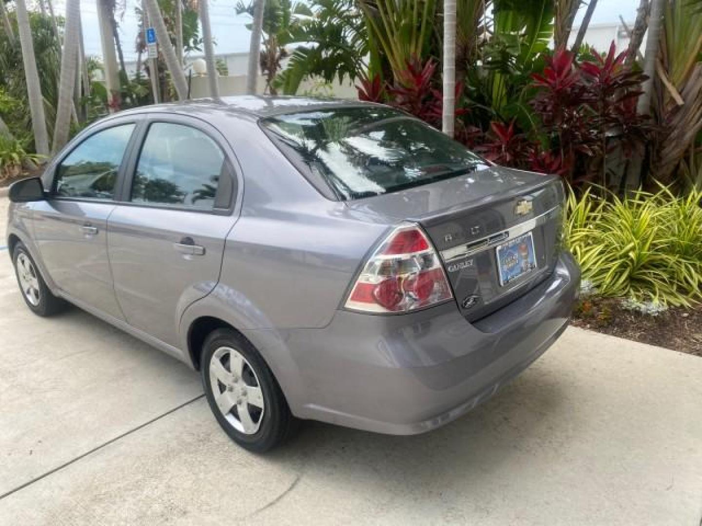 2011 Medium Gray /Charcoal Chevrolet Aveo LS LOW MILES 18,701 (KL1TD5DE5BB) with an Ecotec 1.6L DOHC 16-Valve 4-Cyl MFI Engine engine, Automatic transmission, located at 4701 North Dixie Hwy, Pompano Beach, FL, 33064, (954) 422-2889, 26.240938, -80.123474 - OUR WEBPAGE FLORIDACARS1.COM HAS OVER 100 PHOTOS AND FREE CARFAX LINK 2011 CHEVROLET AVEO LT VIN: KL1TD5DE5BB141987 K L 1 T D 5 D E 5 B B 1 4 1 9 8 7 SEDAN 4 DR 1.6L I4 F DOHC 16V GASOLINE 35 MPG FRONT WHEEL DRIVE Top Features Cloth Seats Basic Features AM/FM Stereo Automatic Transmission Cruise Con - Photo#68
