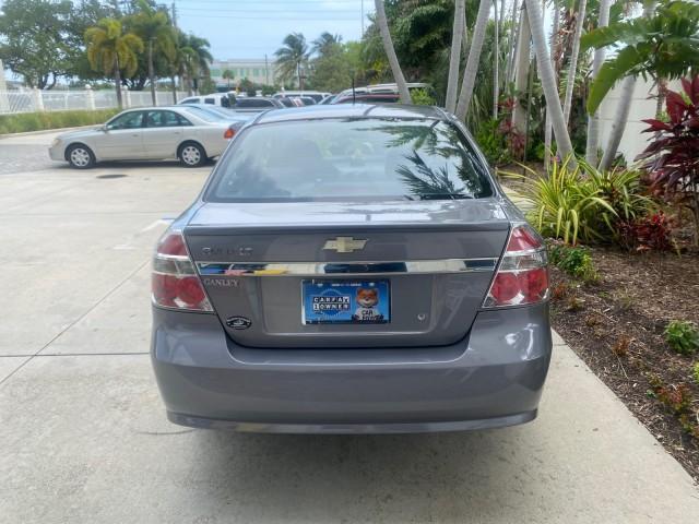 2011 Medium Gray /Charcoal Chevrolet Aveo LS LOW MILES 18,766 (KL1TD5DE5BB) with an Ecotec 1.6L DOHC 16-Valve 4-Cyl MFI Engine engine, Automatic transmission, located at 4701 North Dixie Hwy, Pompano Beach, FL, 33064, (954) 422-2889, 26.240938, -80.123474 - OUR WEBPAGE FLORIDACARS1.COM HAS OVER 100 PHOTOS AND FREE CARFAX LINK 2011 CHEVROLET AVEO LT VIN: KL1TD5DE5BB141987 K L 1 T D 5 D E 5 B B 1 4 1 9 8 7 SEDAN 4 DR 1.6L I4 F DOHC 16V GASOLINE 35 MPG FRONT WHEEL DRIVE Top Features Cloth Seats Basic Features AM/FM Stereo Automatic Transmission Cruise Con - Photo#69