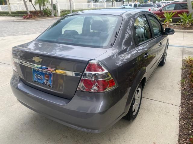 2011 Medium Gray /Charcoal Chevrolet Aveo LS LOW MILES 18,766 (KL1TD5DE5BB) with an Ecotec 1.6L DOHC 16-Valve 4-Cyl MFI Engine engine, Automatic transmission, located at 4701 North Dixie Hwy, Pompano Beach, FL, 33064, (954) 422-2889, 26.240938, -80.123474 - OUR WEBPAGE FLORIDACARS1.COM HAS OVER 100 PHOTOS AND FREE CARFAX LINK 2011 CHEVROLET AVEO LT VIN: KL1TD5DE5BB141987 K L 1 T D 5 D E 5 B B 1 4 1 9 8 7 SEDAN 4 DR 1.6L I4 F DOHC 16V GASOLINE 35 MPG FRONT WHEEL DRIVE Top Features Cloth Seats Basic Features AM/FM Stereo Automatic Transmission Cruise Con - Photo#70