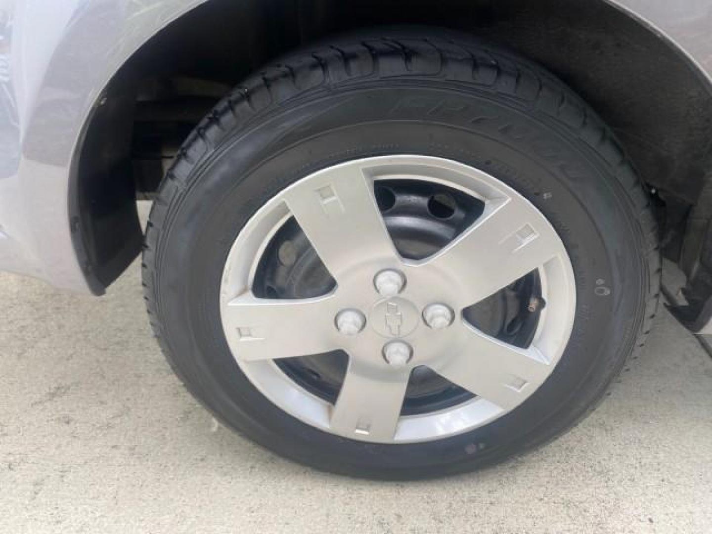 2011 Medium Gray /Charcoal Chevrolet Aveo LS LOW MILES 18,701 (KL1TD5DE5BB) with an Ecotec 1.6L DOHC 16-Valve 4-Cyl MFI Engine engine, Automatic transmission, located at 4701 North Dixie Hwy, Pompano Beach, FL, 33064, (954) 422-2889, 26.240938, -80.123474 - OUR WEBPAGE FLORIDACARS1.COM HAS OVER 100 PHOTOS AND FREE CARFAX LINK 2011 CHEVROLET AVEO LT VIN: KL1TD5DE5BB141987 K L 1 T D 5 D E 5 B B 1 4 1 9 8 7 SEDAN 4 DR 1.6L I4 F DOHC 16V GASOLINE 35 MPG FRONT WHEEL DRIVE Top Features Cloth Seats Basic Features AM/FM Stereo Automatic Transmission Cruise Con - Photo#76