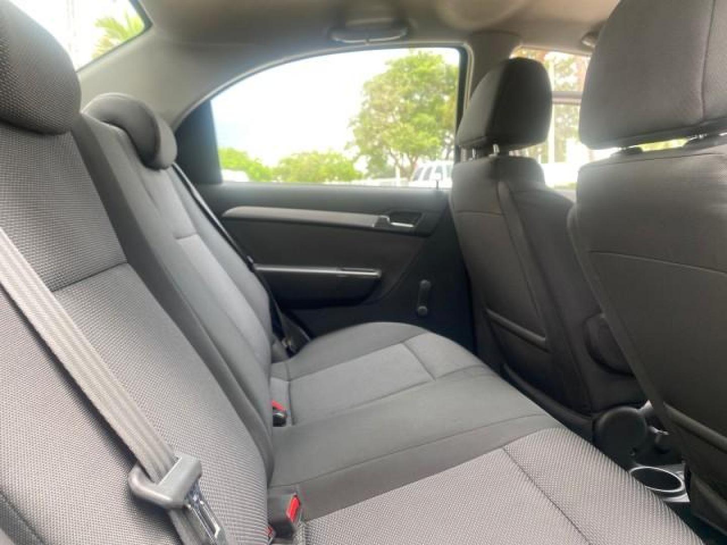2011 Medium Gray /Charcoal Chevrolet Aveo LS LOW MILES 18,701 (KL1TD5DE5BB) with an Ecotec 1.6L DOHC 16-Valve 4-Cyl MFI Engine engine, Automatic transmission, located at 4701 North Dixie Hwy, Pompano Beach, FL, 33064, (954) 422-2889, 26.240938, -80.123474 - OUR WEBPAGE FLORIDACARS1.COM HAS OVER 100 PHOTOS AND FREE CARFAX LINK 2011 CHEVROLET AVEO LT VIN: KL1TD5DE5BB141987 K L 1 T D 5 D E 5 B B 1 4 1 9 8 7 SEDAN 4 DR 1.6L I4 F DOHC 16V GASOLINE 35 MPG FRONT WHEEL DRIVE Top Features Cloth Seats Basic Features AM/FM Stereo Automatic Transmission Cruise Con - Photo#81