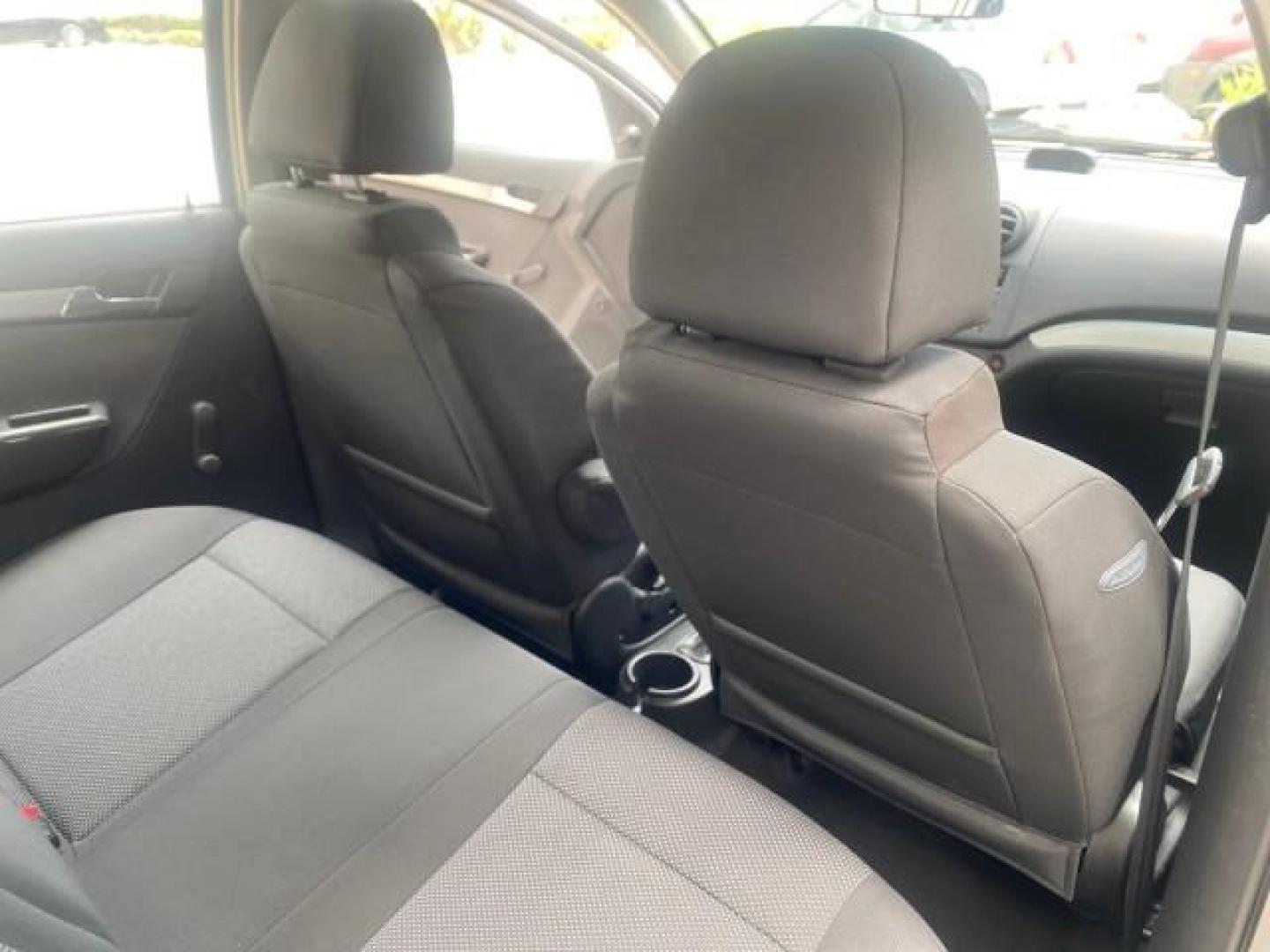 2011 Medium Gray /Charcoal Chevrolet Aveo LS LOW MILES 18,701 (KL1TD5DE5BB) with an Ecotec 1.6L DOHC 16-Valve 4-Cyl MFI Engine engine, Automatic transmission, located at 4701 North Dixie Hwy, Pompano Beach, FL, 33064, (954) 422-2889, 26.240938, -80.123474 - OUR WEBPAGE FLORIDACARS1.COM HAS OVER 100 PHOTOS AND FREE CARFAX LINK 2011 CHEVROLET AVEO LT VIN: KL1TD5DE5BB141987 K L 1 T D 5 D E 5 B B 1 4 1 9 8 7 SEDAN 4 DR 1.6L I4 F DOHC 16V GASOLINE 35 MPG FRONT WHEEL DRIVE Top Features Cloth Seats Basic Features AM/FM Stereo Automatic Transmission Cruise Con - Photo#83