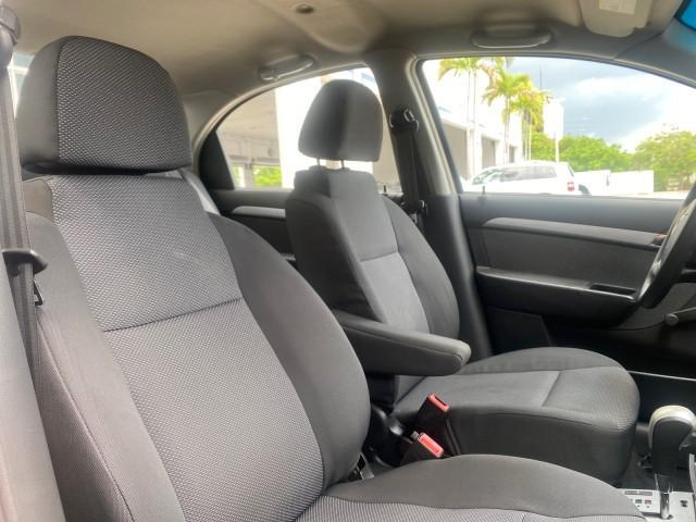 2011 Medium Gray /Charcoal Chevrolet Aveo LS LOW MILES 18,766 (KL1TD5DE5BB) with an Ecotec 1.6L DOHC 16-Valve 4-Cyl MFI Engine engine, Automatic transmission, located at 4701 North Dixie Hwy, Pompano Beach, FL, 33064, (954) 422-2889, 26.240938, -80.123474 - OUR WEBPAGE FLORIDACARS1.COM HAS OVER 100 PHOTOS AND FREE CARFAX LINK 2011 CHEVROLET AVEO LT VIN: KL1TD5DE5BB141987 K L 1 T D 5 D E 5 B B 1 4 1 9 8 7 SEDAN 4 DR 1.6L I4 F DOHC 16V GASOLINE 35 MPG FRONT WHEEL DRIVE Top Features Cloth Seats Basic Features AM/FM Stereo Automatic Transmission Cruise Con - Photo#87